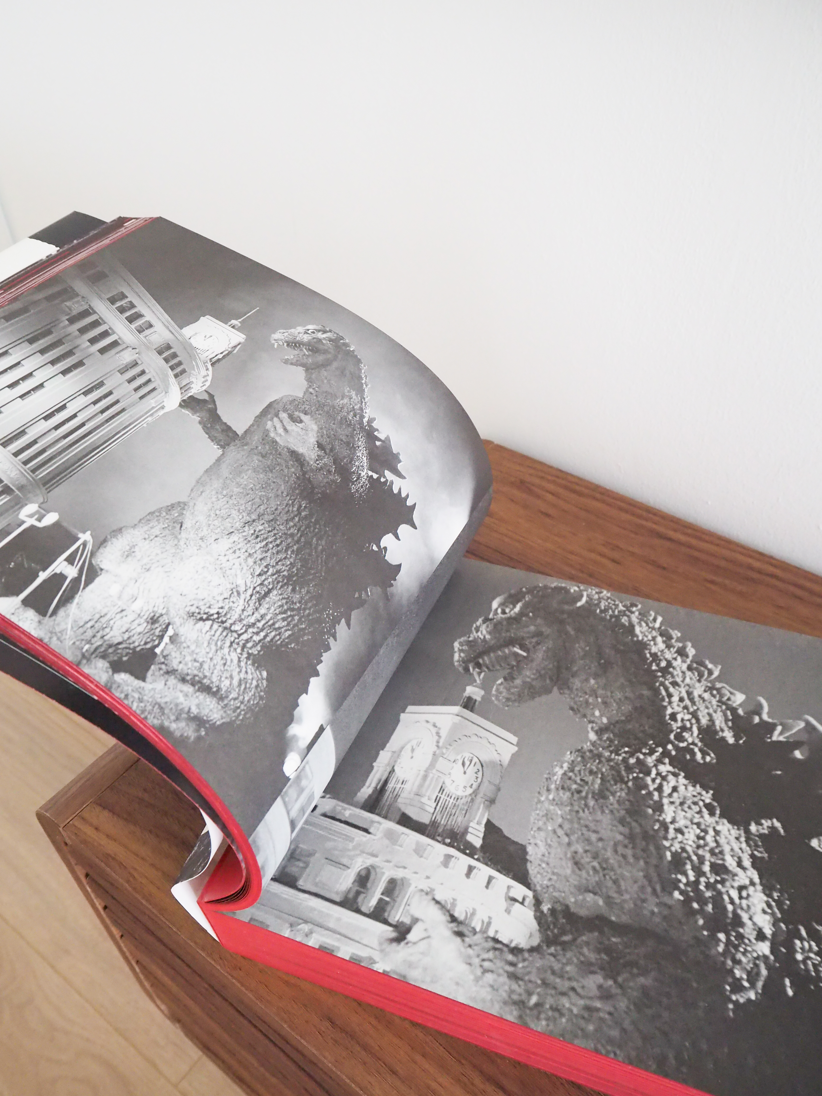 Our living room with no built-in carpentry  - monochrome photograph, Godzilla, Godzilla vs. Kong, Godzilla statue, Godzilla