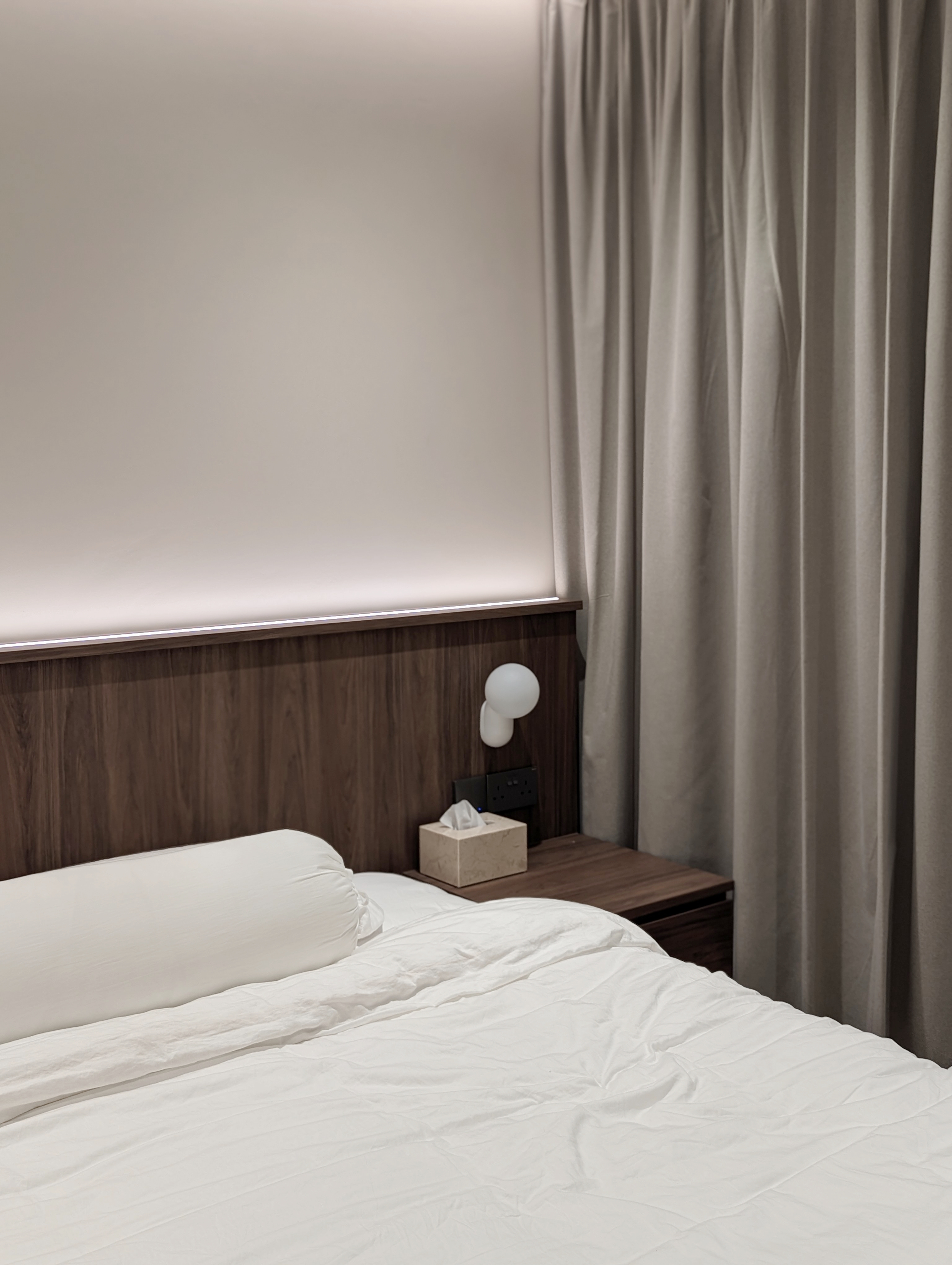 Bedroom: Our cosy sanctuary  - Modern minimalist bedroom, soft lighting, white bedspread, wooden headboard, bedside table