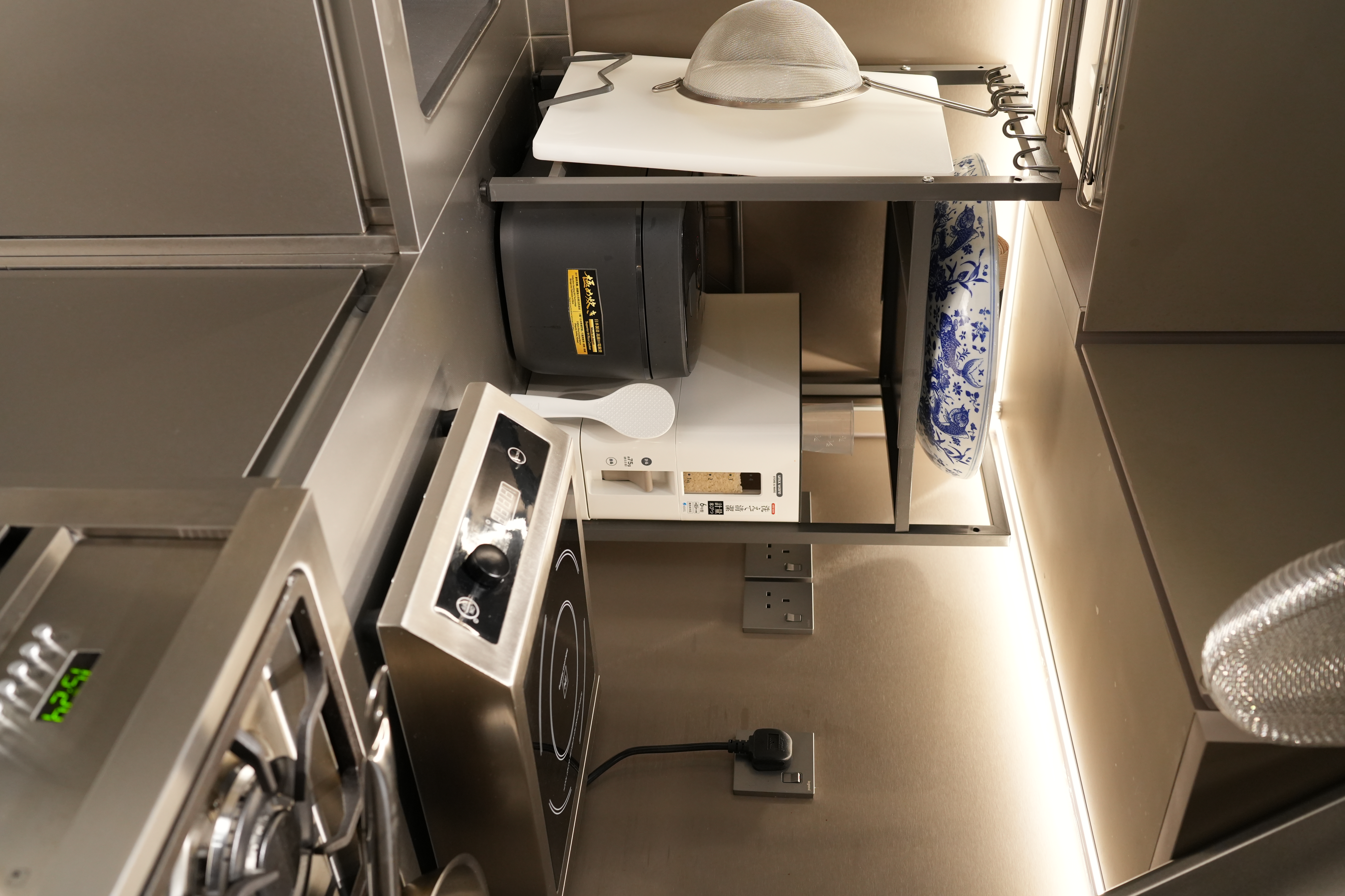 A Chef's Kitchen: Stainless Steel & Japanese Monotonal Design - Mini kitchen, compact space, stainless steel appliances