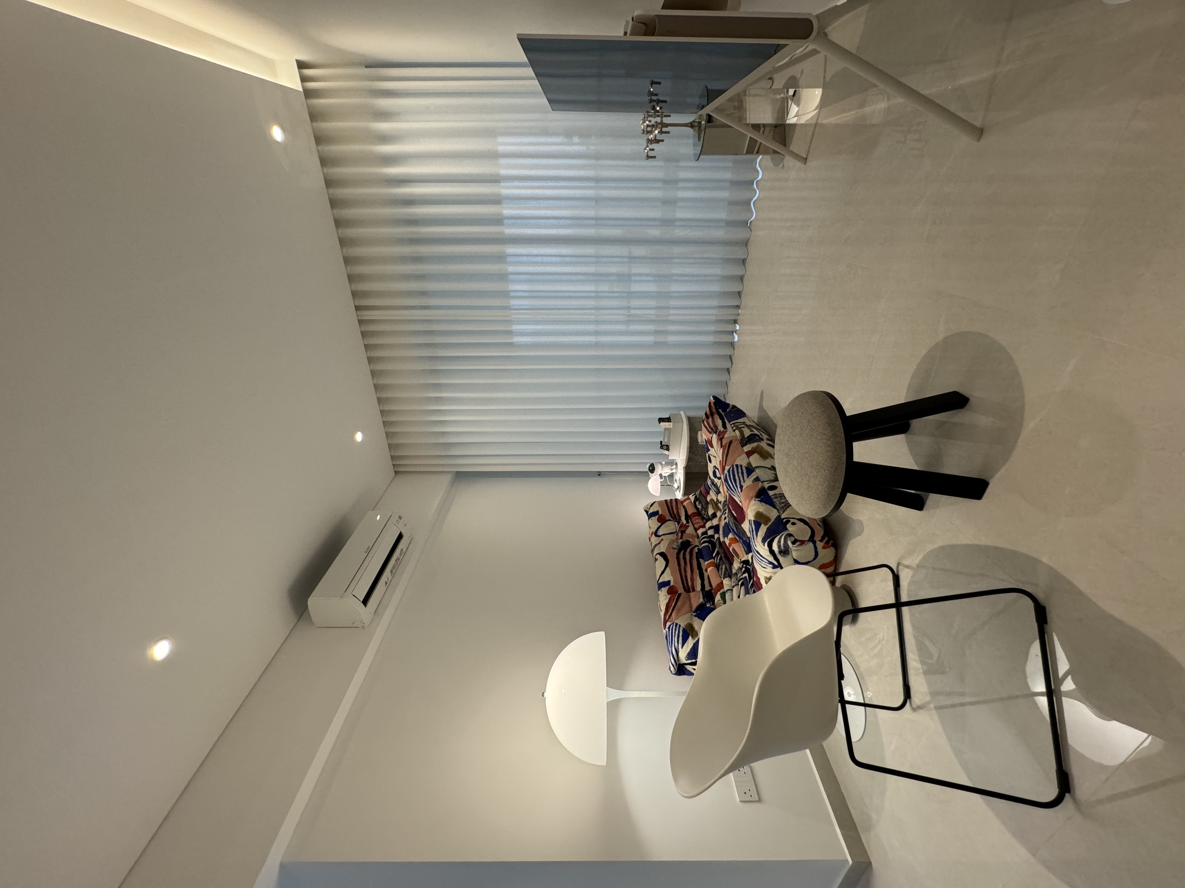 Living @ Rumah Beacon - Modern minimalist living room, contemporary furniture, abstract art, soft natural light, sleek