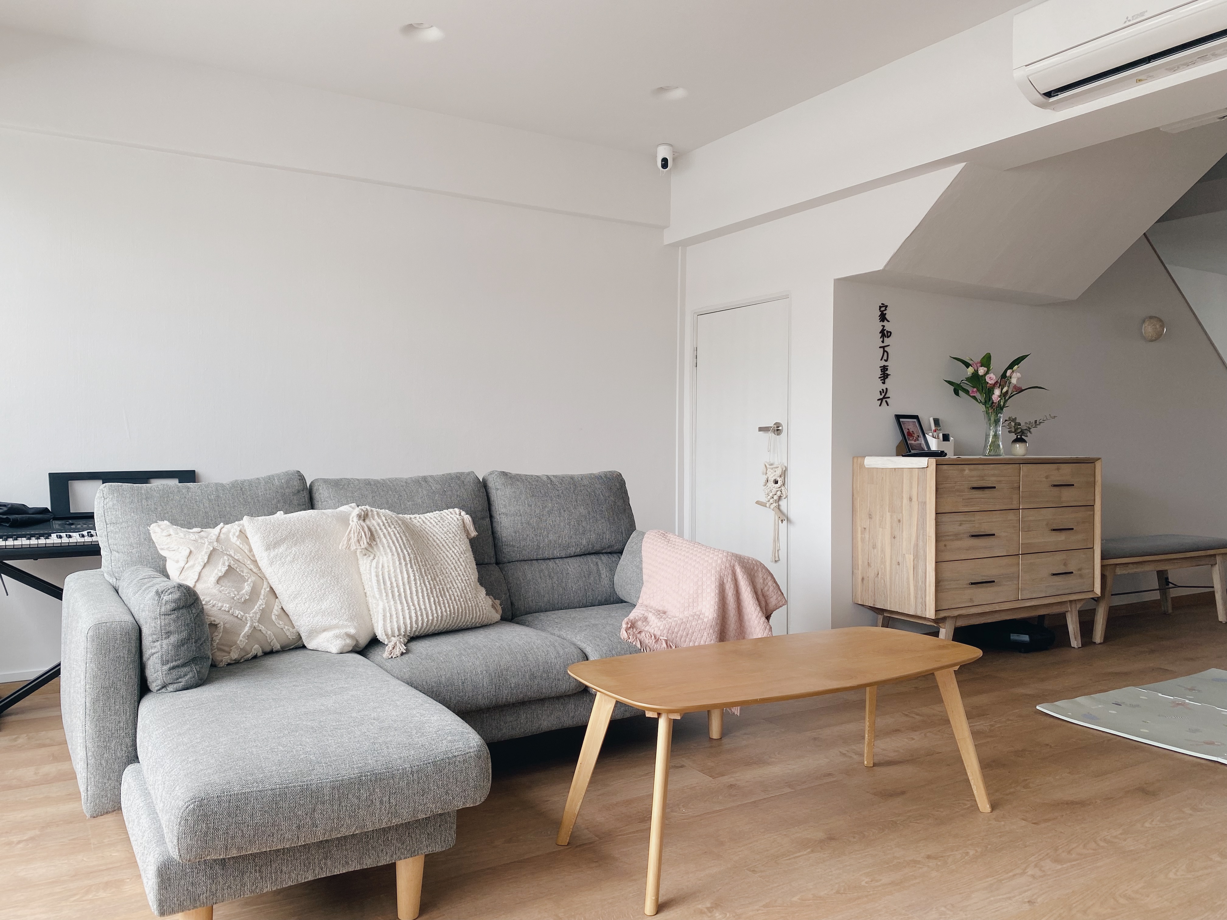 Our Family Friendly Haven: A Modern Farmhouse Living Room - Modern minimalist living room, cozy gray sofa, white walls
