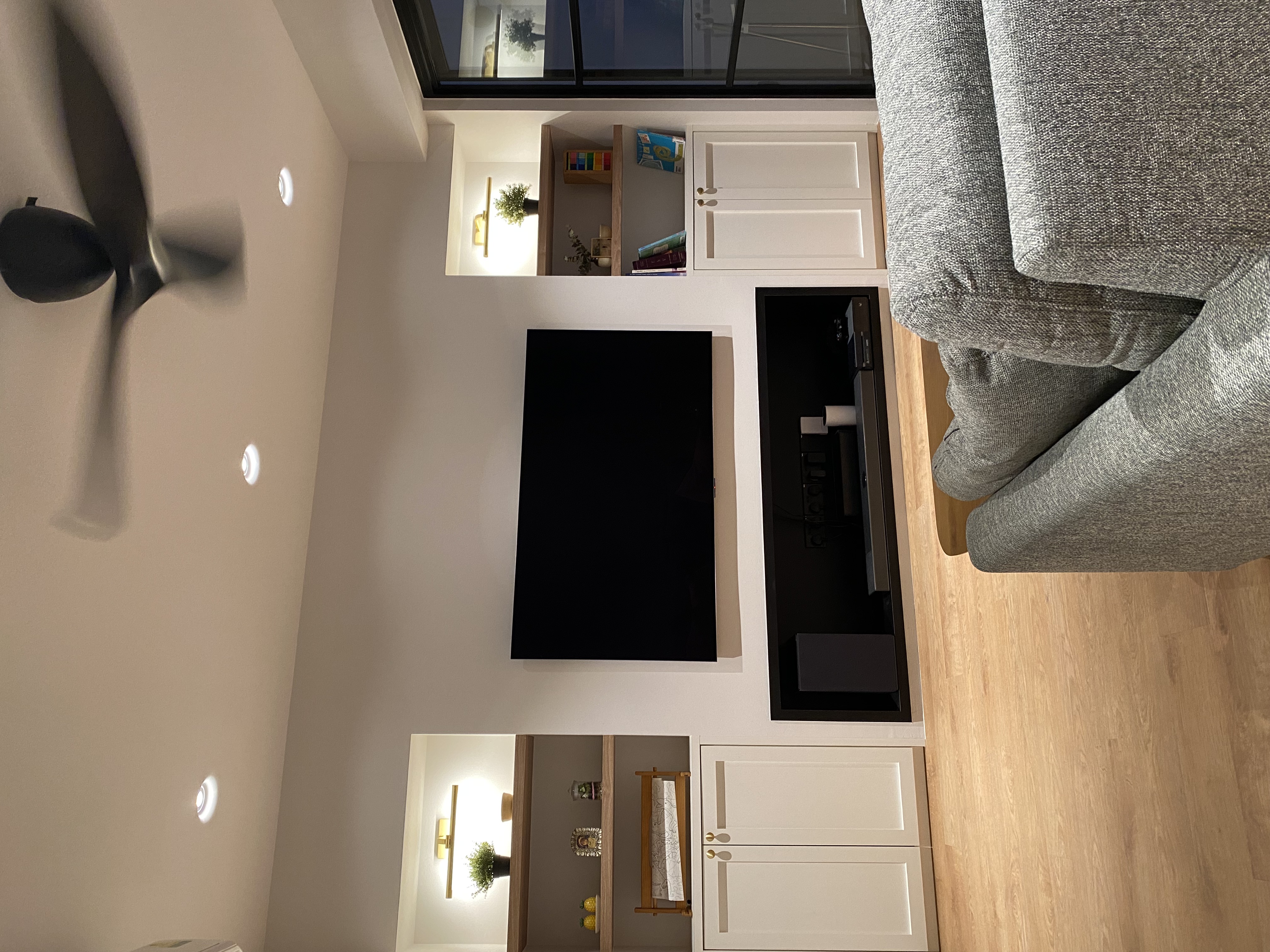 Our Family Friendly Haven: A Modern Farmhouse Living Room - Modern living room, ceiling fan, white walls, minimalist design