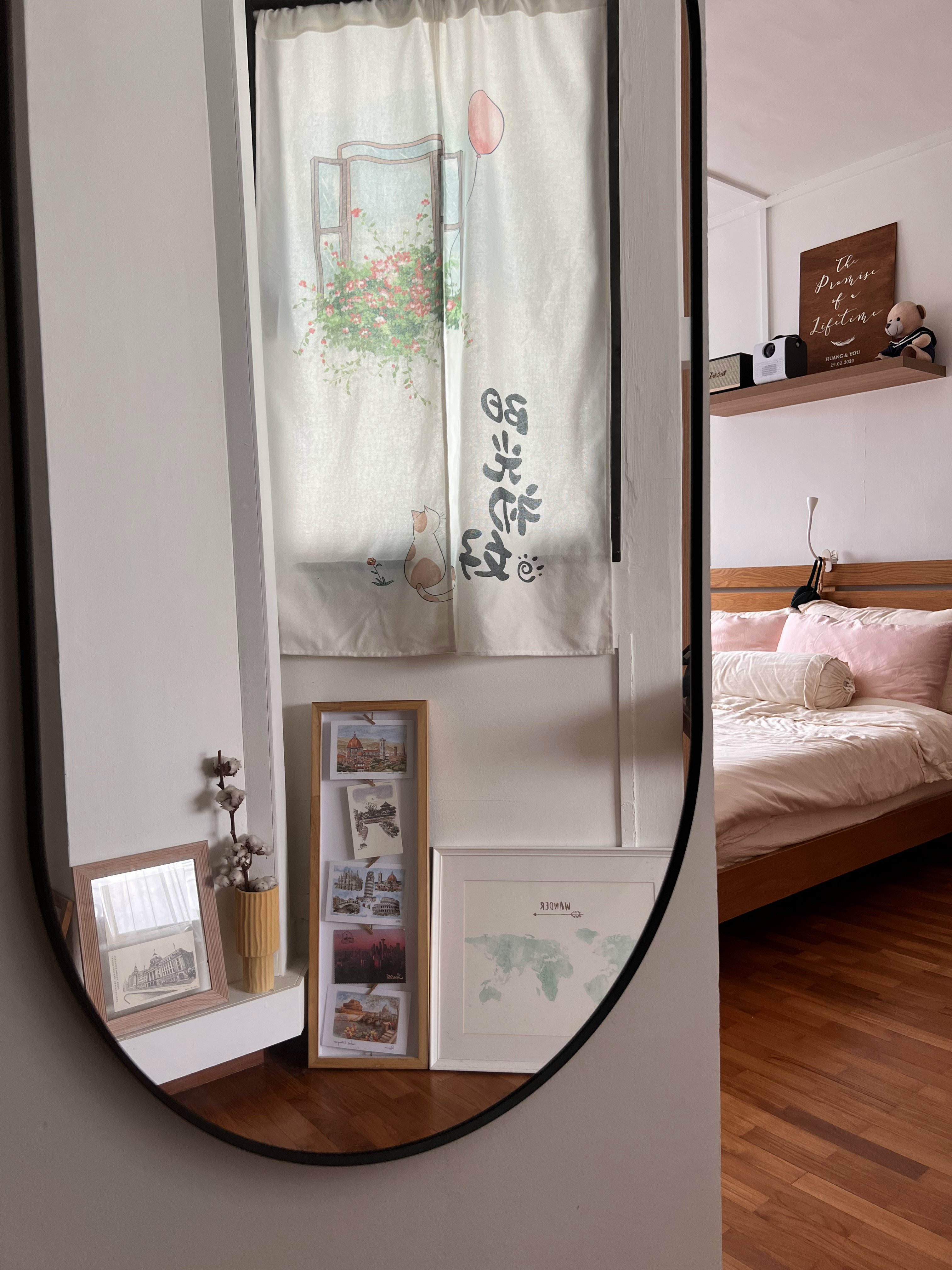 Cozy Farmhouse Bedroom with Projector and Faux Fireplace - Soft, pastel curtains with a floral design and a red balloon, a