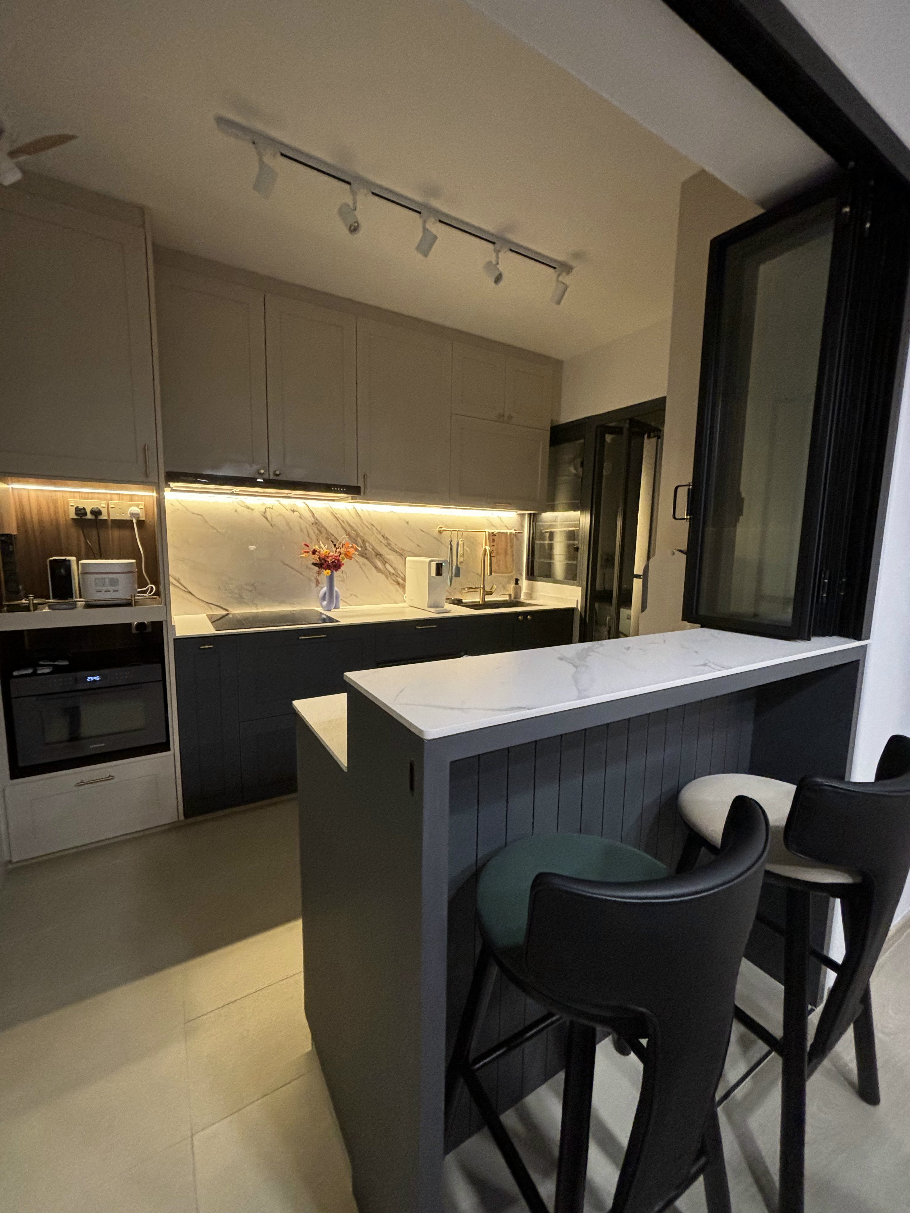 Vibe them up with ambient lighting! - Modern kitchen with sleek design, under-cabinet lighting, marble backsplash, built-in