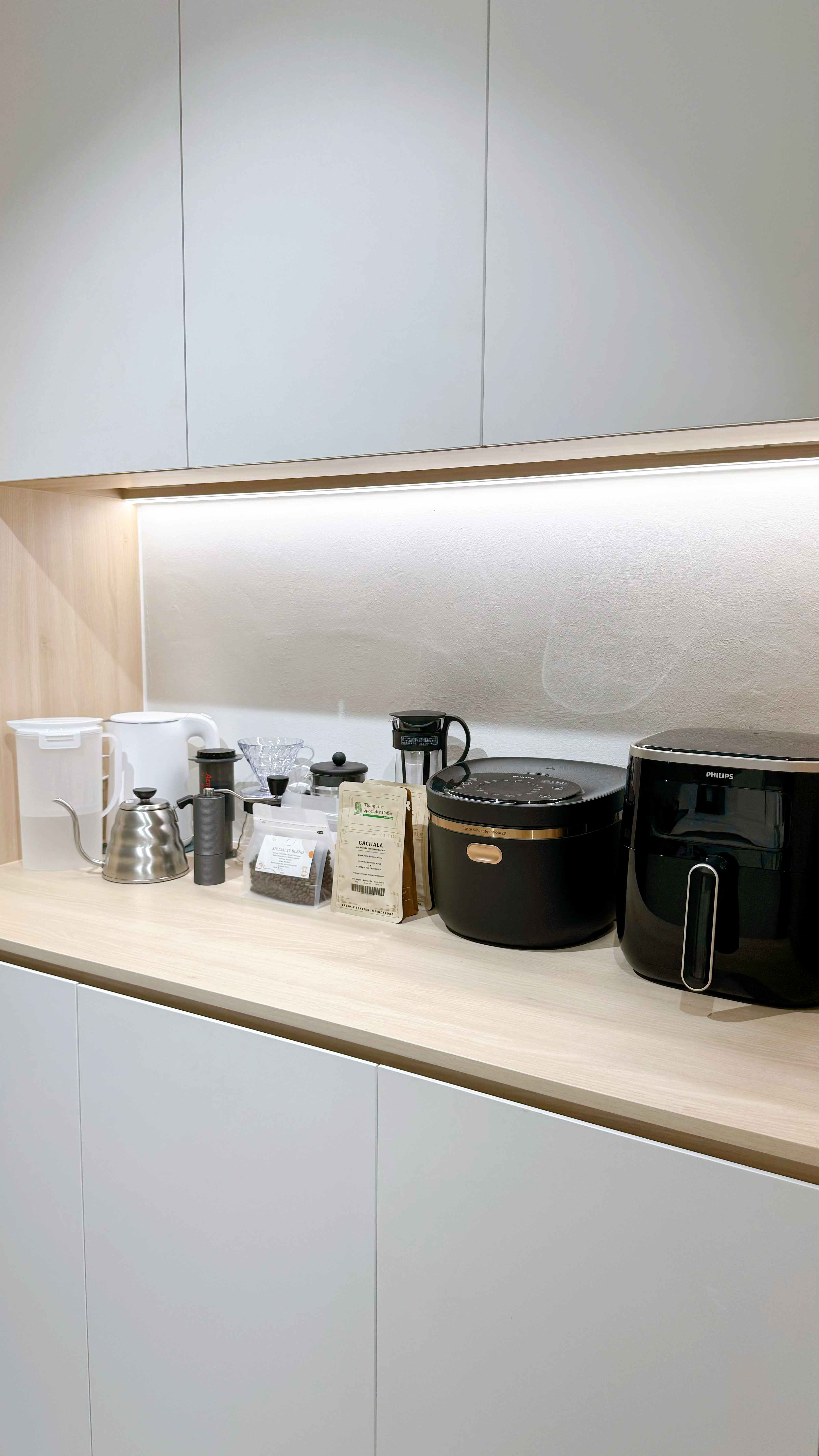 MasterChef Singapore: The Tofu Edition! - White kitchen cabinets, modern appliances, coffee maker, grinder, coffee beans