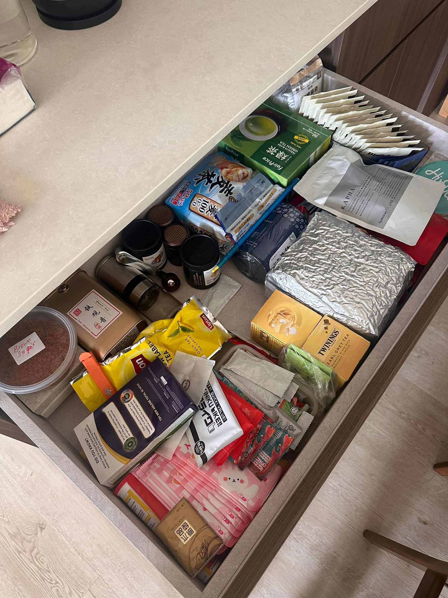 Our Dining Room: A space to gather, dine and share the joy of food. - tea bags, coffee pods, instant coffee, tea boxes, tea