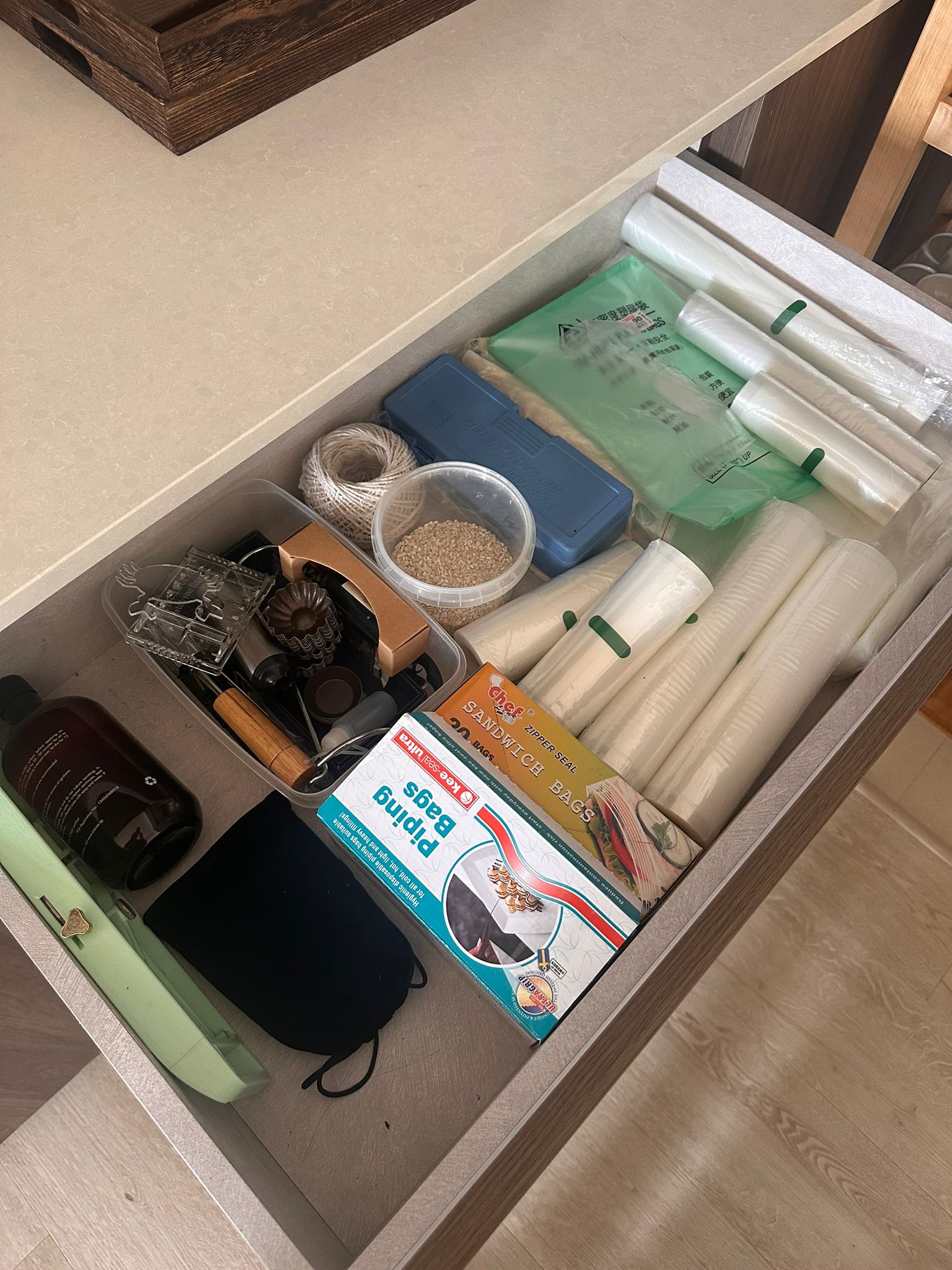 Our Dining Room: A space to gather, dine and share the joy of food. - Organized pantry, neatly arranged, kitchen drawer, food