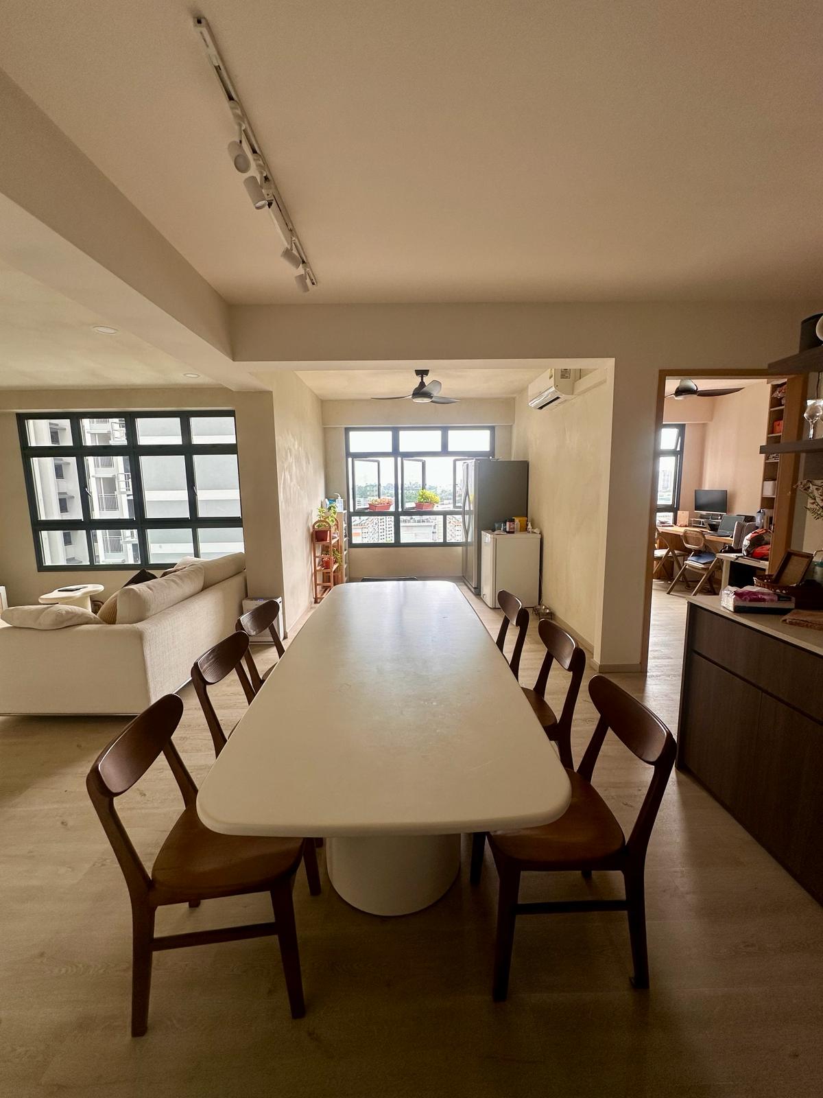 Our Dining Room: A space to gather, dine and share the joy of food. - Modern living room with minimalist design, beige walls