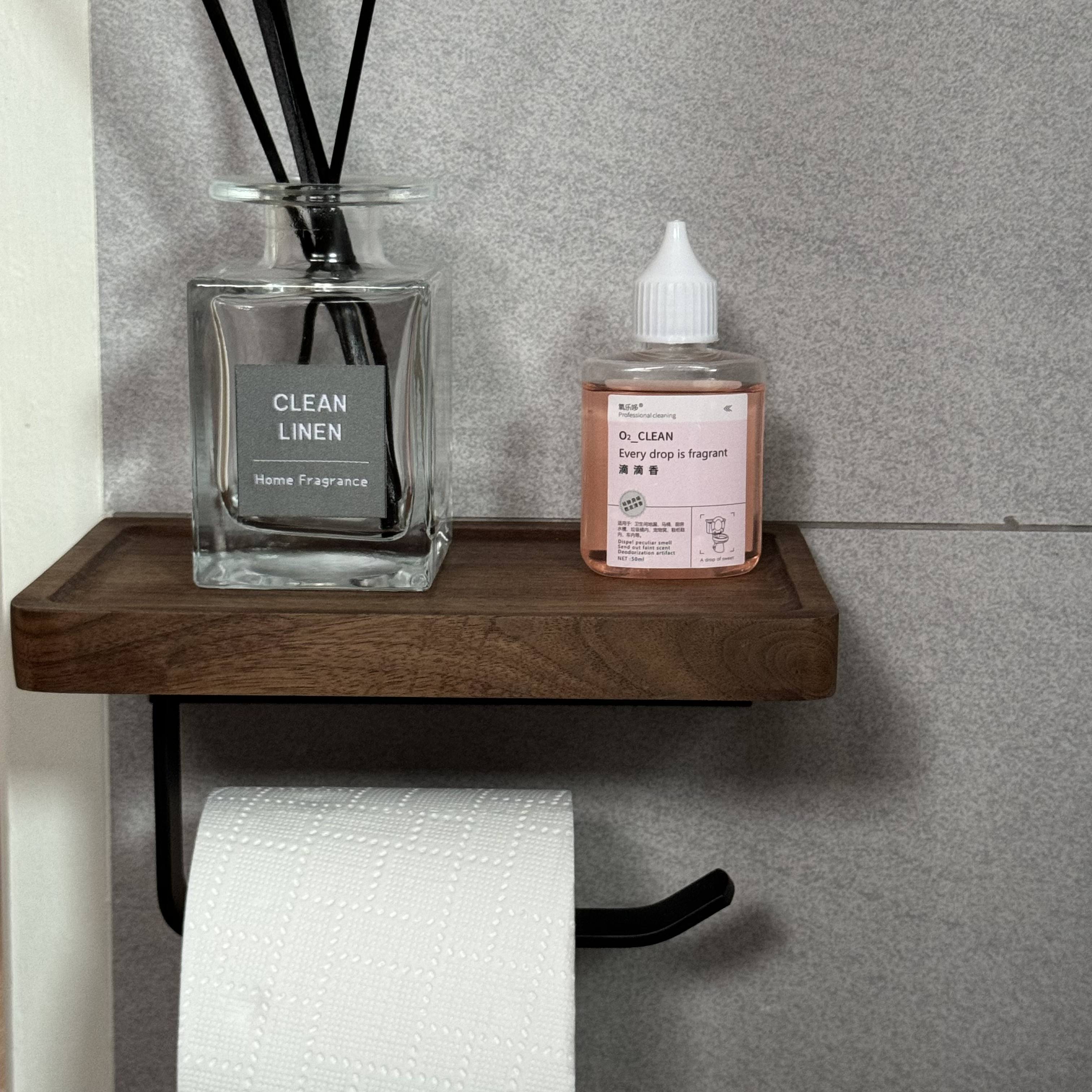The tofus' bathrooms with hidden surprises 🕳️ - Glass perfume bottle labeled "CLEAN LINEN Home Fragrance, " black sticks in