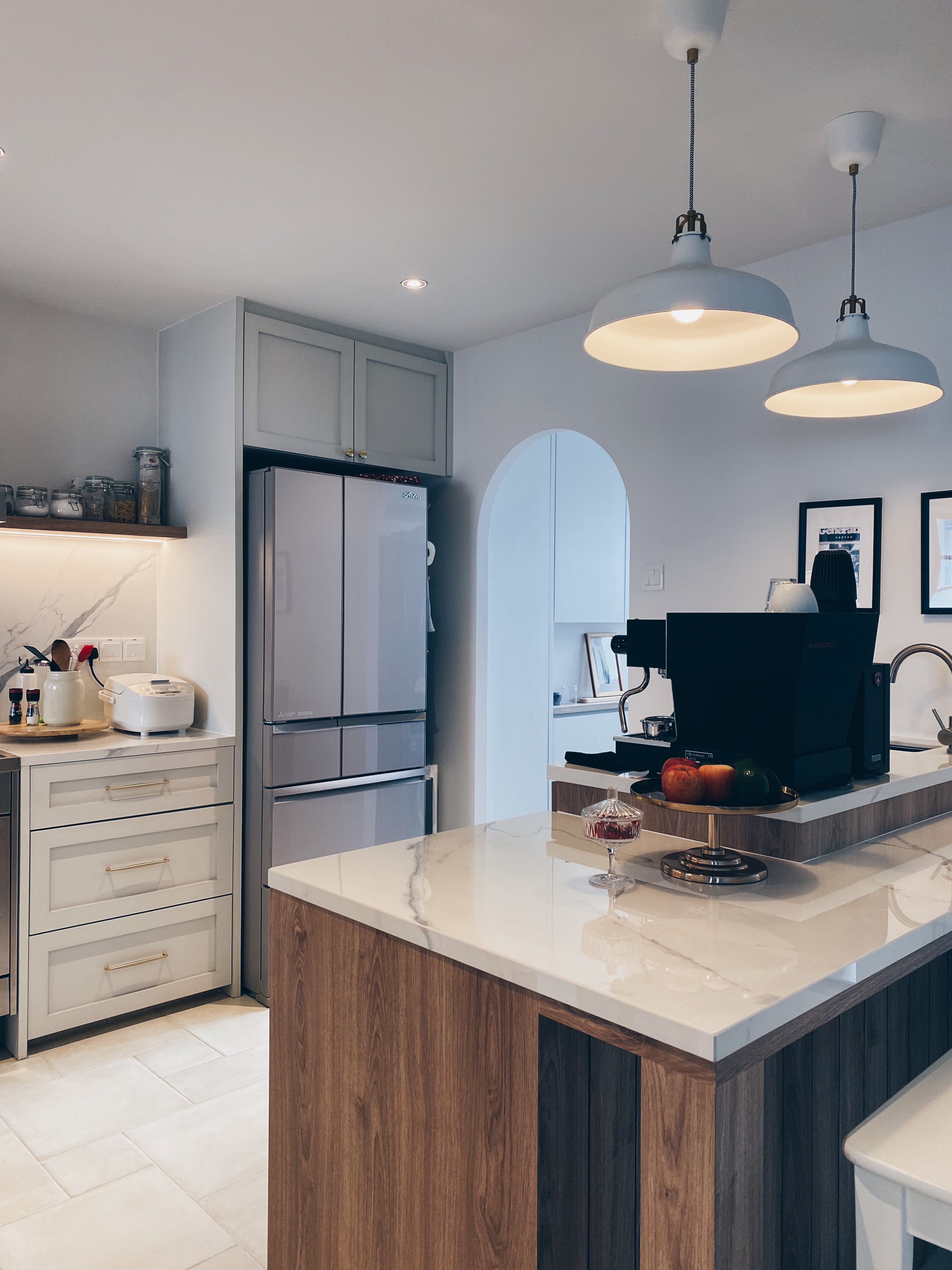 I love a white kitchen, it’s ruining my life, UNTIL ... - Modern kitchen with sleek design, white marble countertops, wooden