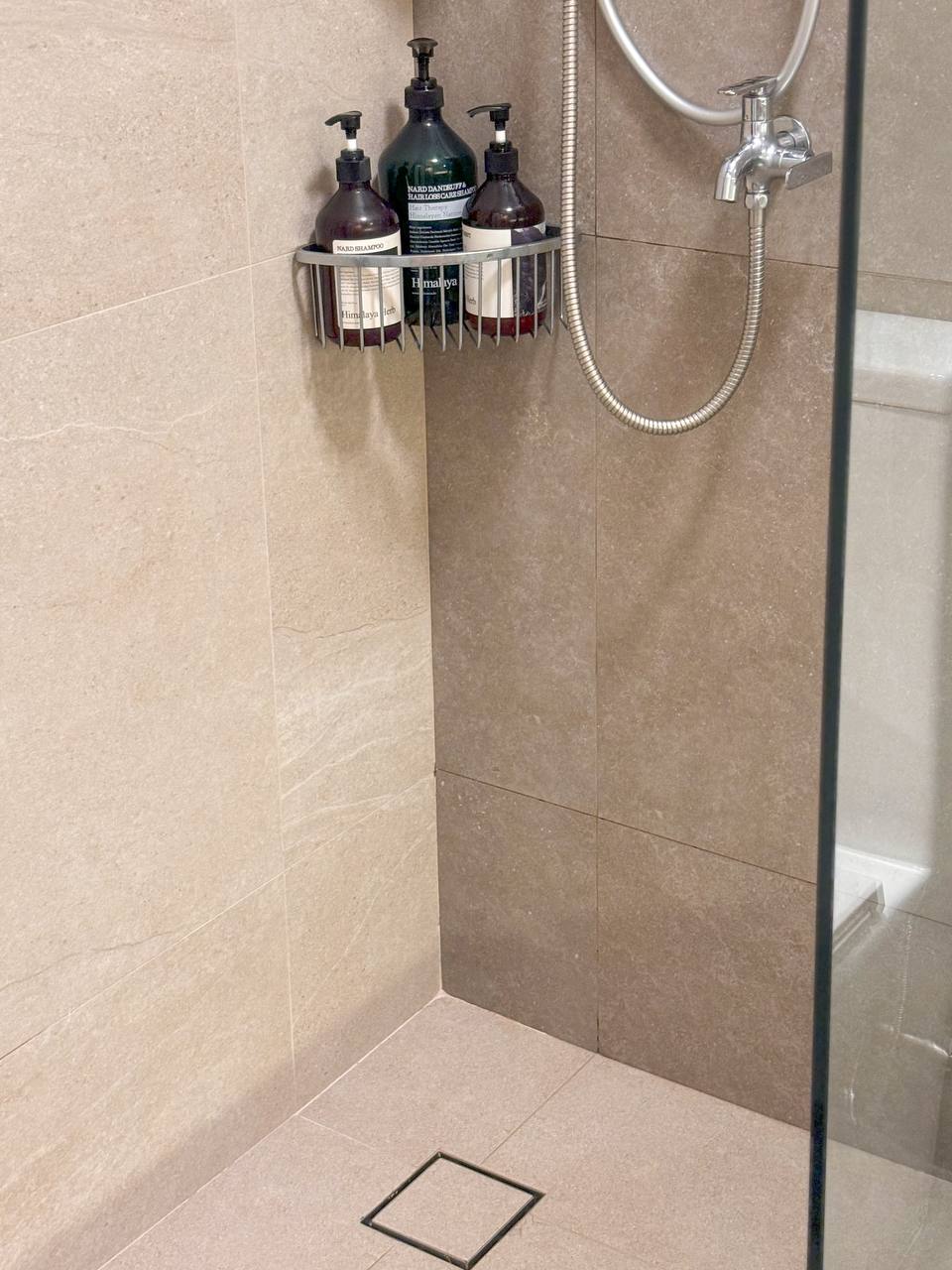 Our Biggest Reno Regrets and Reno Wins - Both in the Bathrooms - Bathroom, shower, tiled wall, beige tiles, modern design