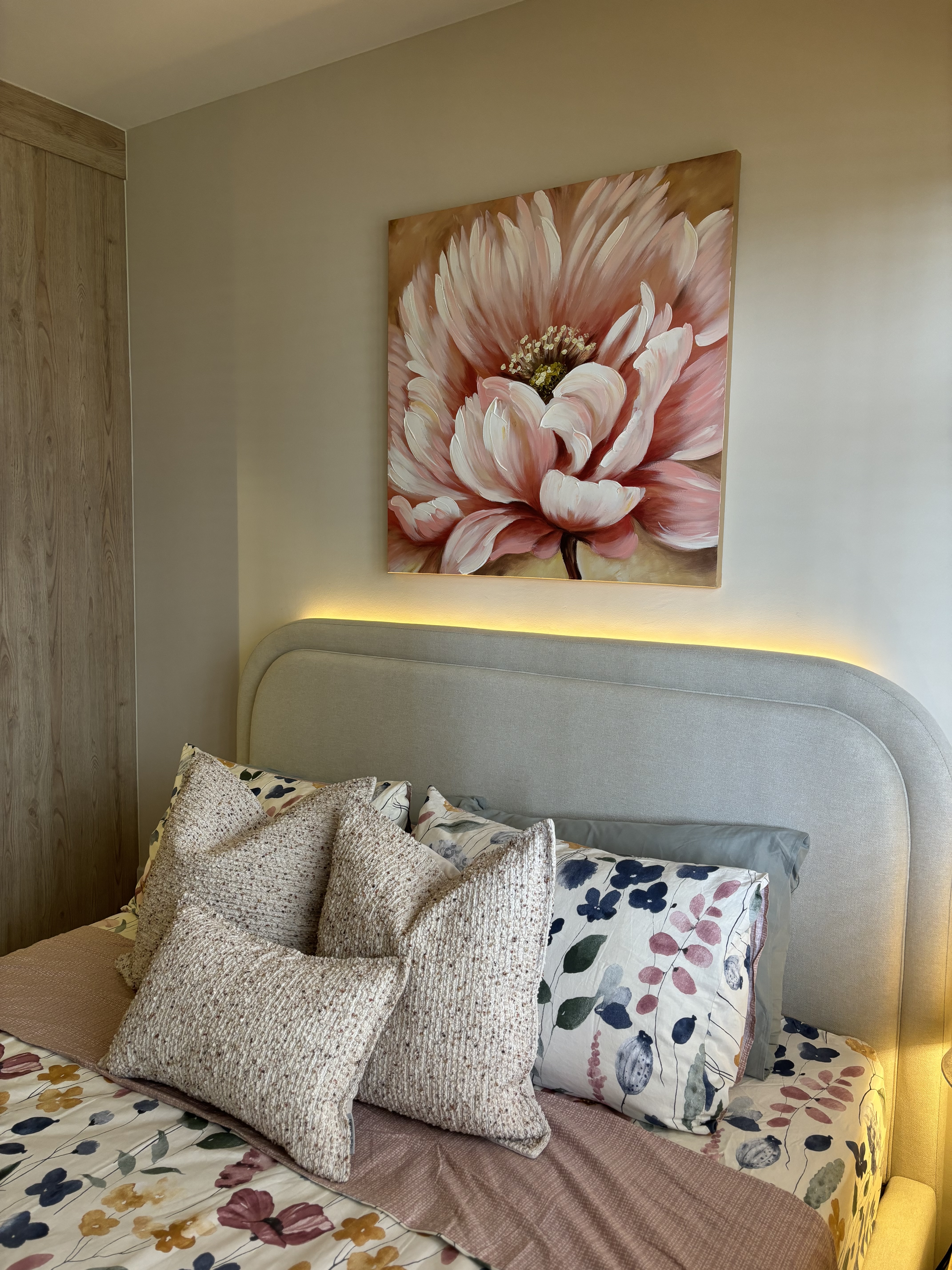 A peek inside our Master Bedroom - Floral-patterned pillows, floral bedspread, cozy bedroom, modern decor, artistic painting