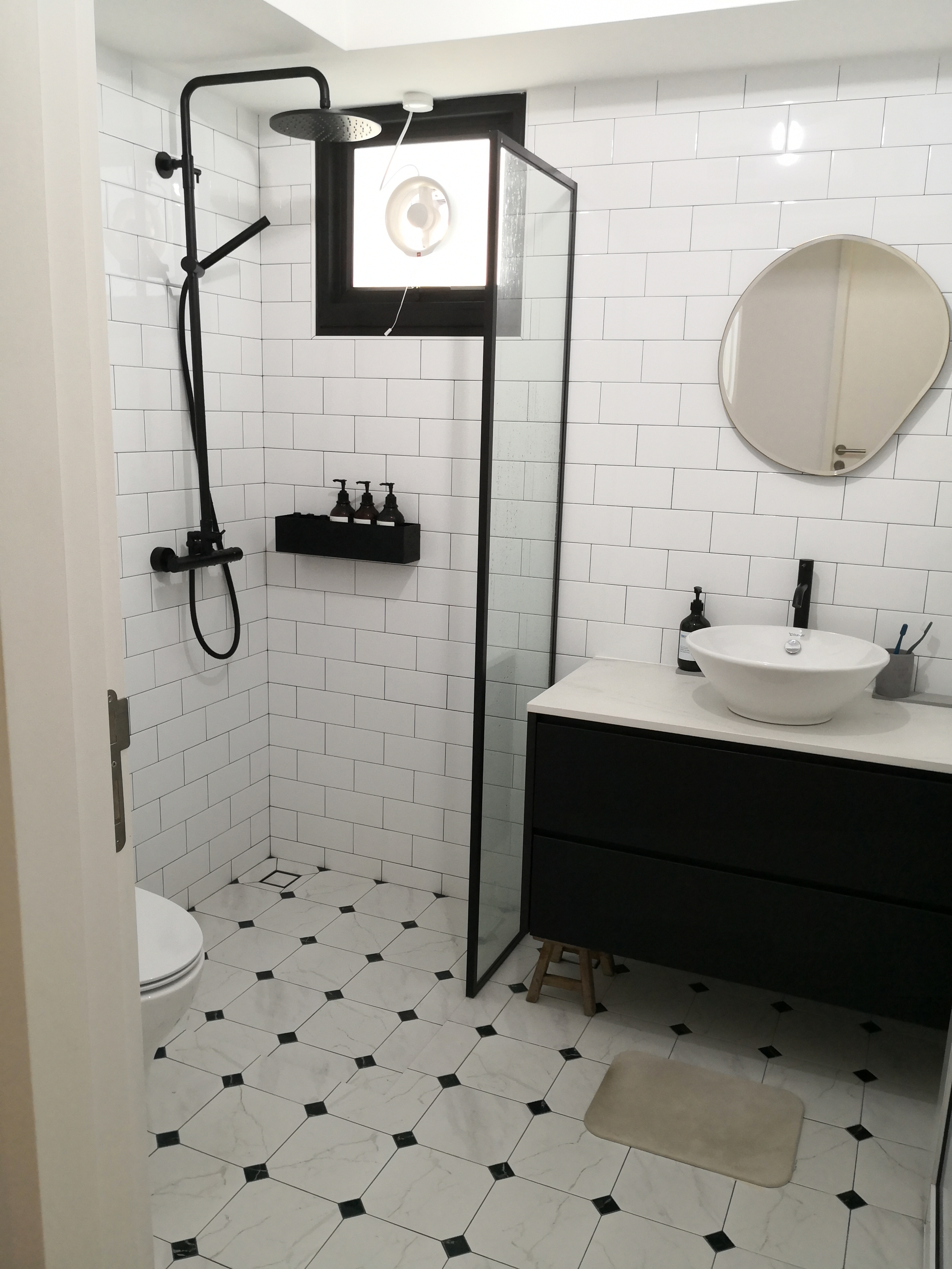 "Oh You Have 3 Bathrooms?!" - modern bathroom, contemporary design, minimalist decor, black and white tiles, sleek fixtures