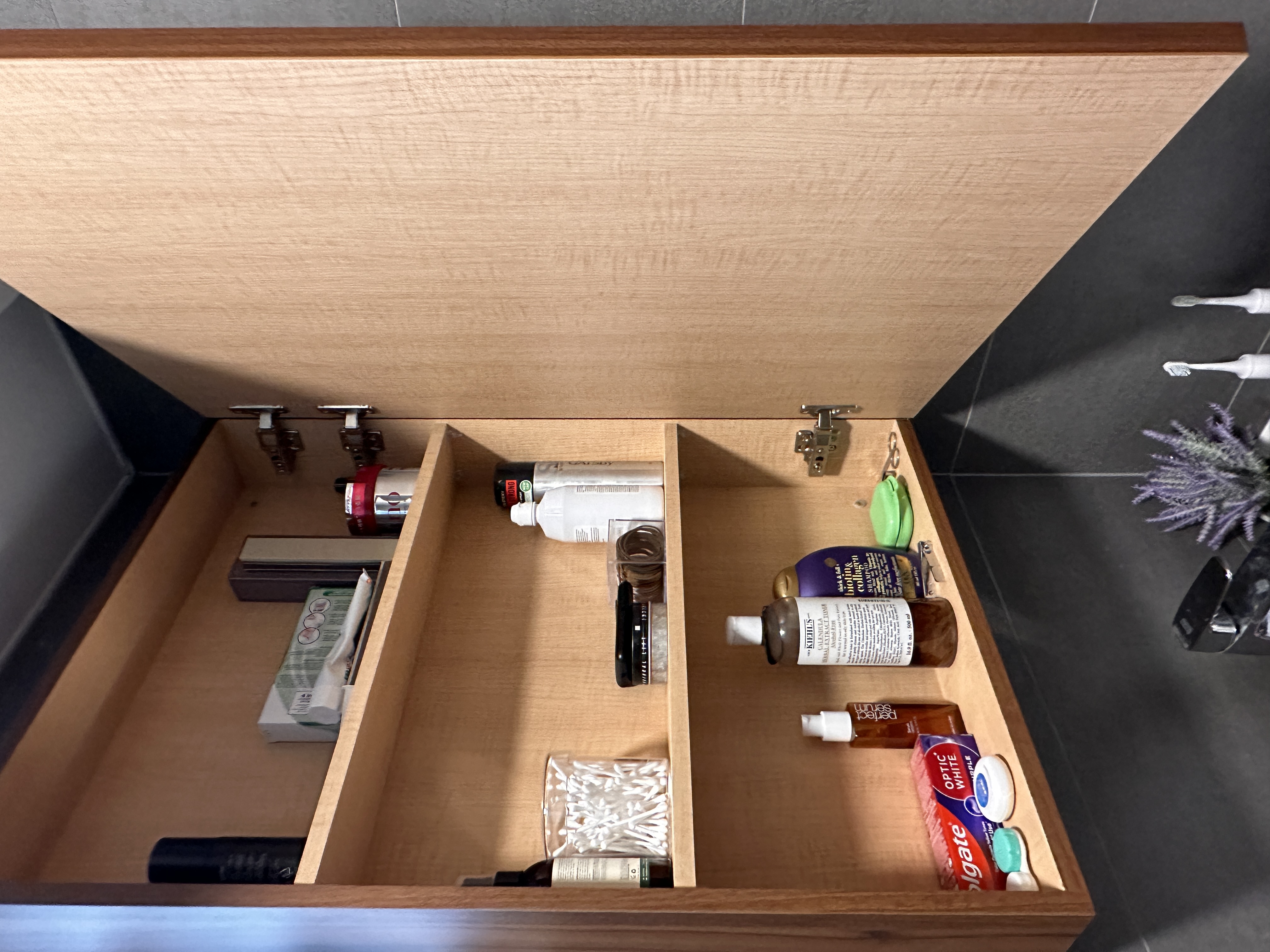 Our toilets - minimal yet functional, just the way we love! - Wooden medicine cabinet, open drawer, neatly organized