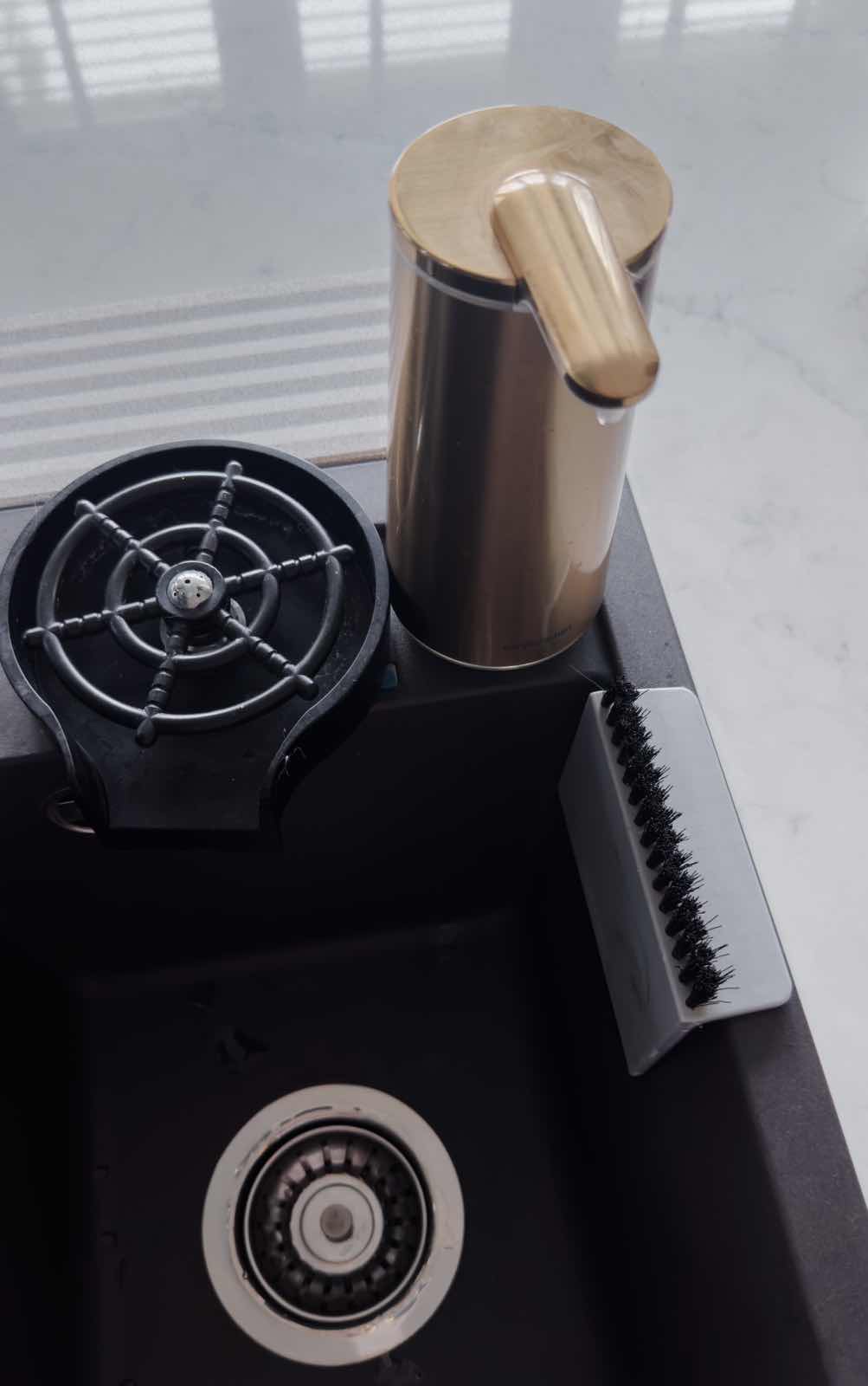 Kitchen Alchemy: The Magic of My Open-Closed Concept Kitchen - Gas stove with brass knob, black burner, metallic stove top