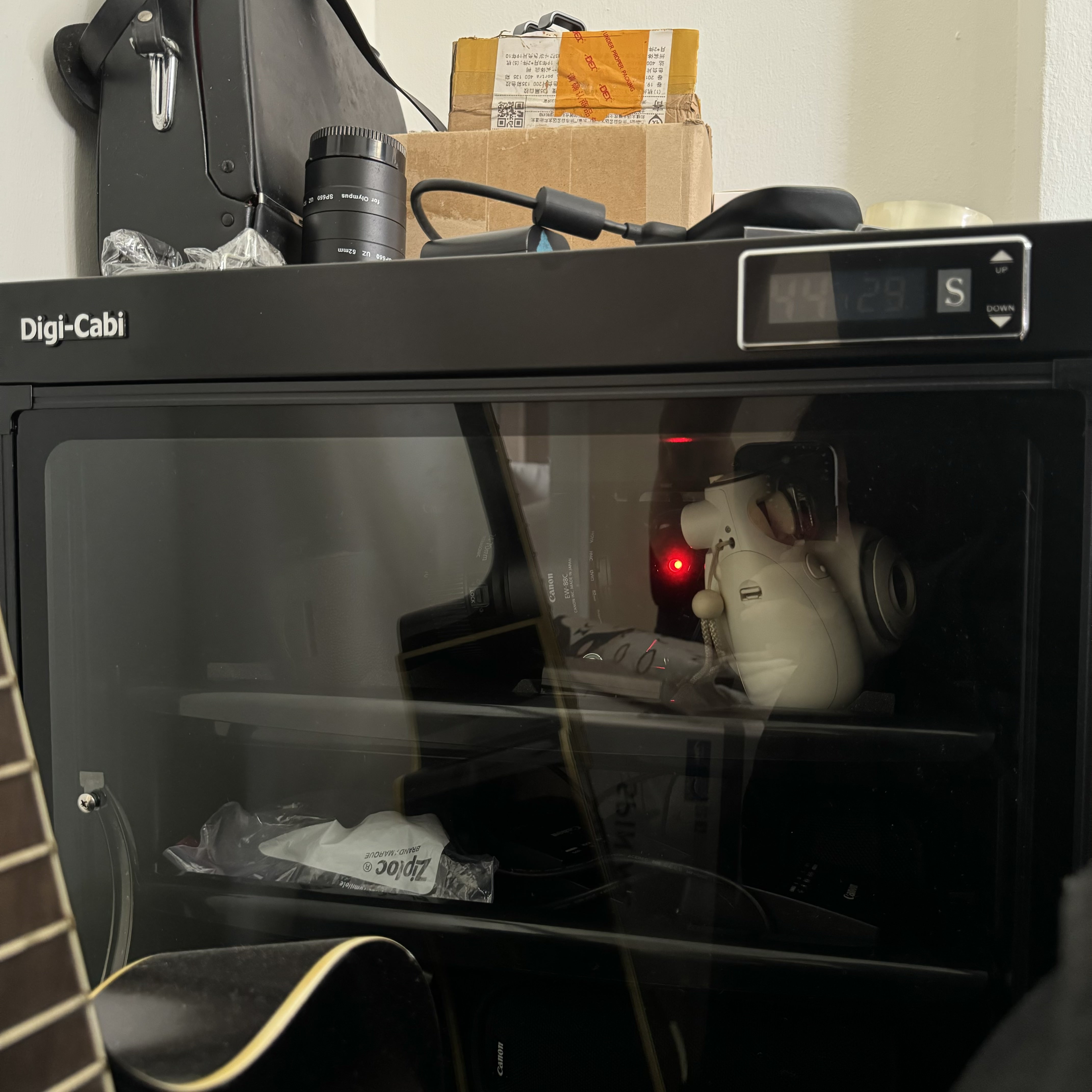 A tiny study room for the tiny tofus  - Digi-Cabi, camera equipment, interior setting, black cabinet, digital display, white