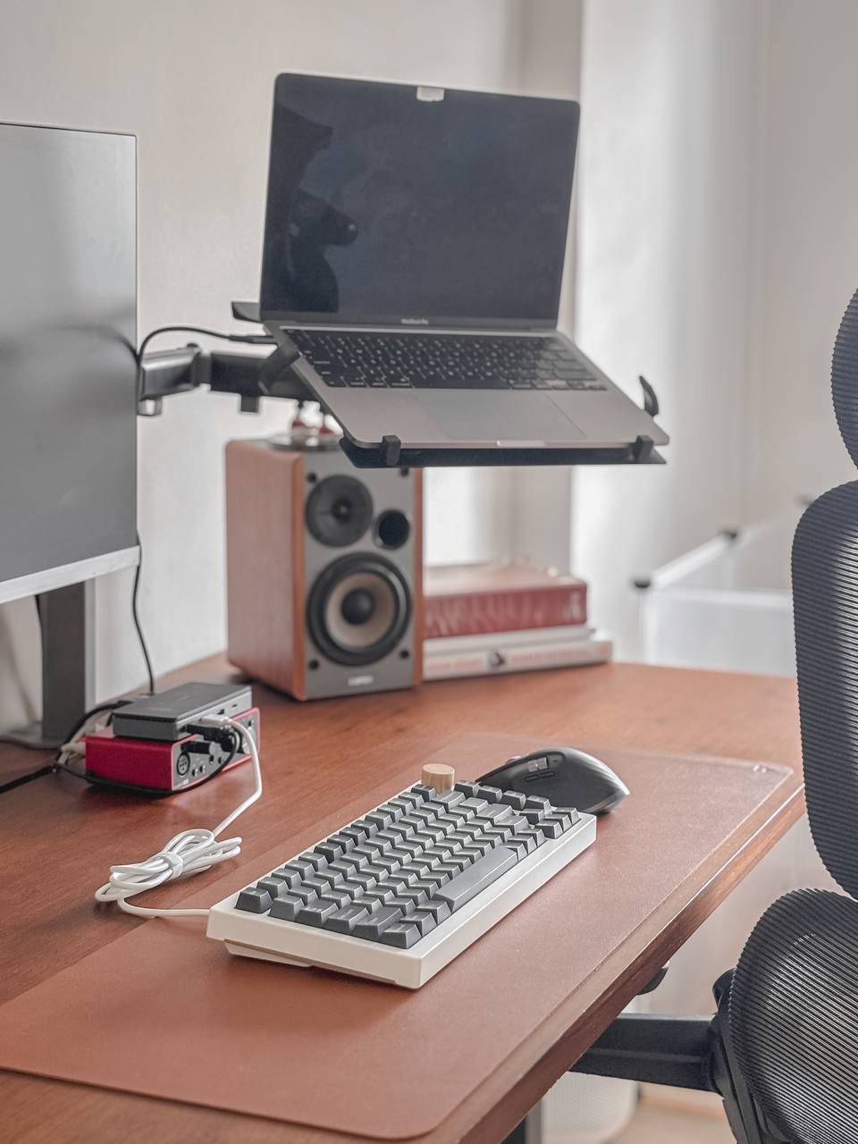 $1k vs $10 Study Room - Laptop on adjustable desk, keyboard and mouse setup, modern workspace, ergonomic chair, dual monitor