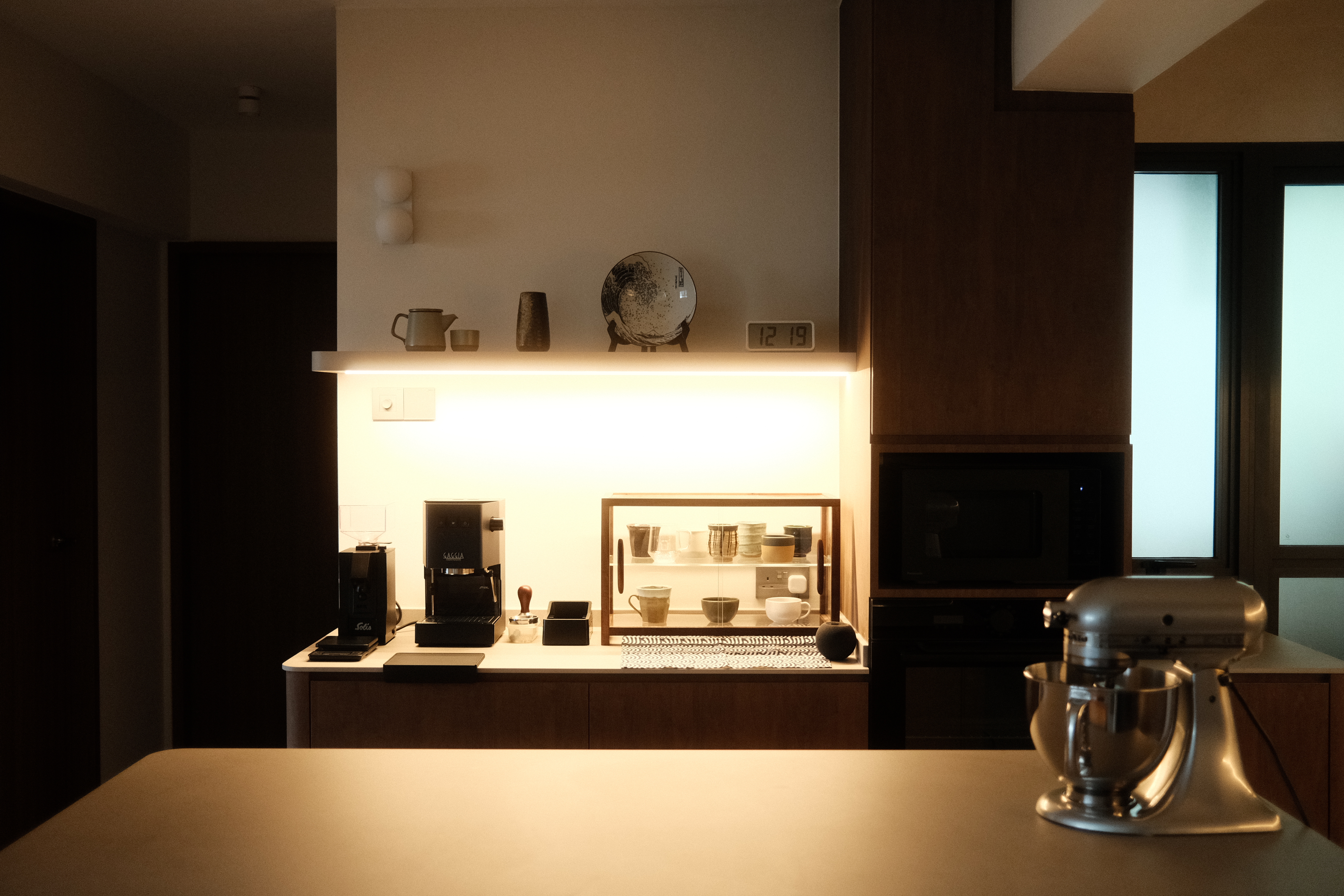 Building the kitchen island of our dreams - Modern kitchen, minimalist design, warm lighting, coffee machine, espresso