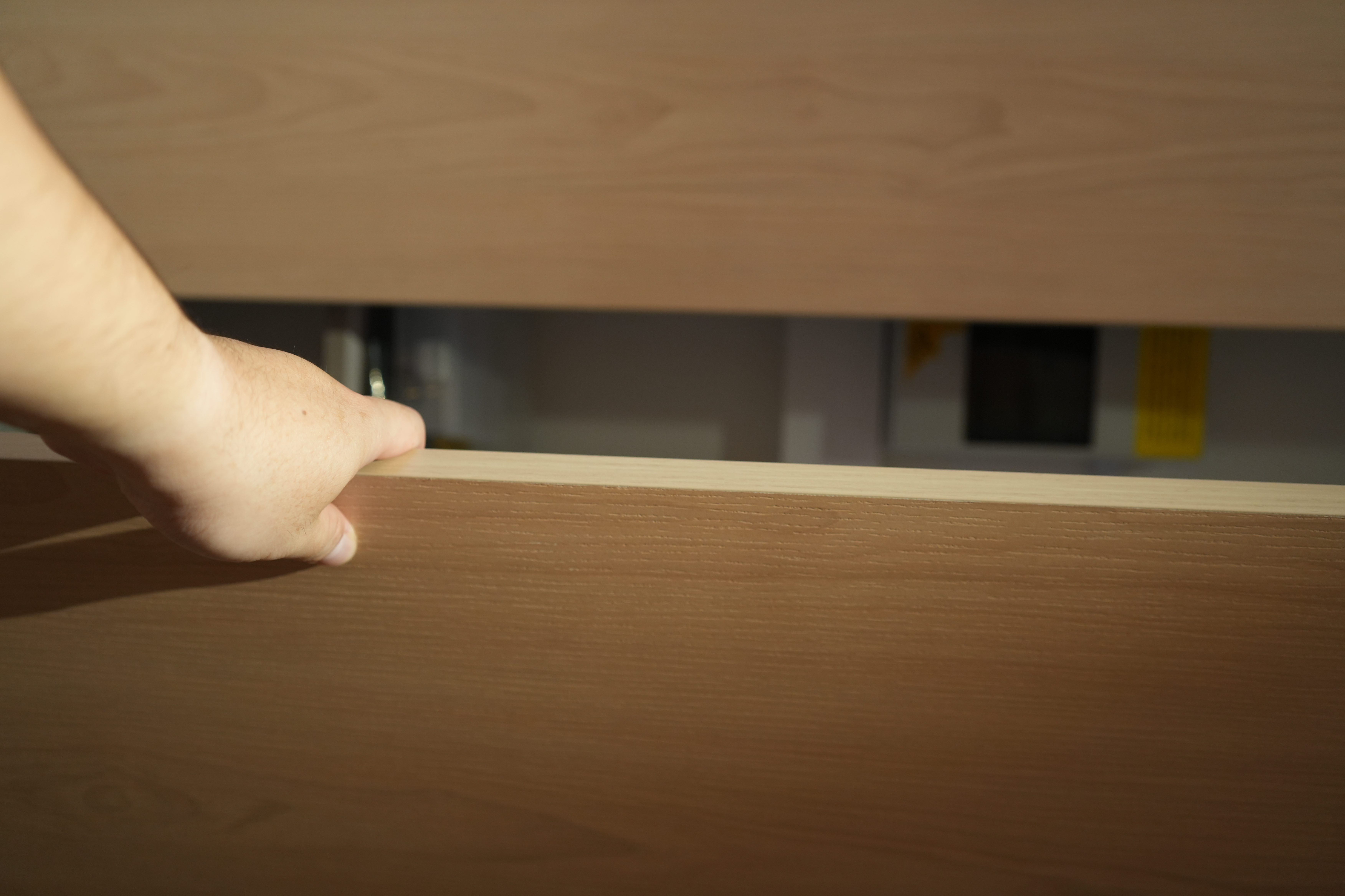Entryway: Putting the "Ta-da" in "Tadaima" with Mod-Trad Japan Vibes - Wooden surface, hand, wooden drawer, wooden table