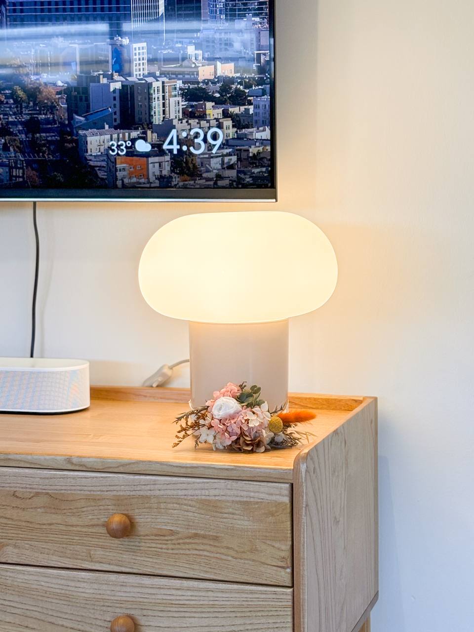 Good Lighting Makes Your House a Home  - 33°, 4:39, cityscape, digital clock, modern decor, wooden dresser, round lamp, white