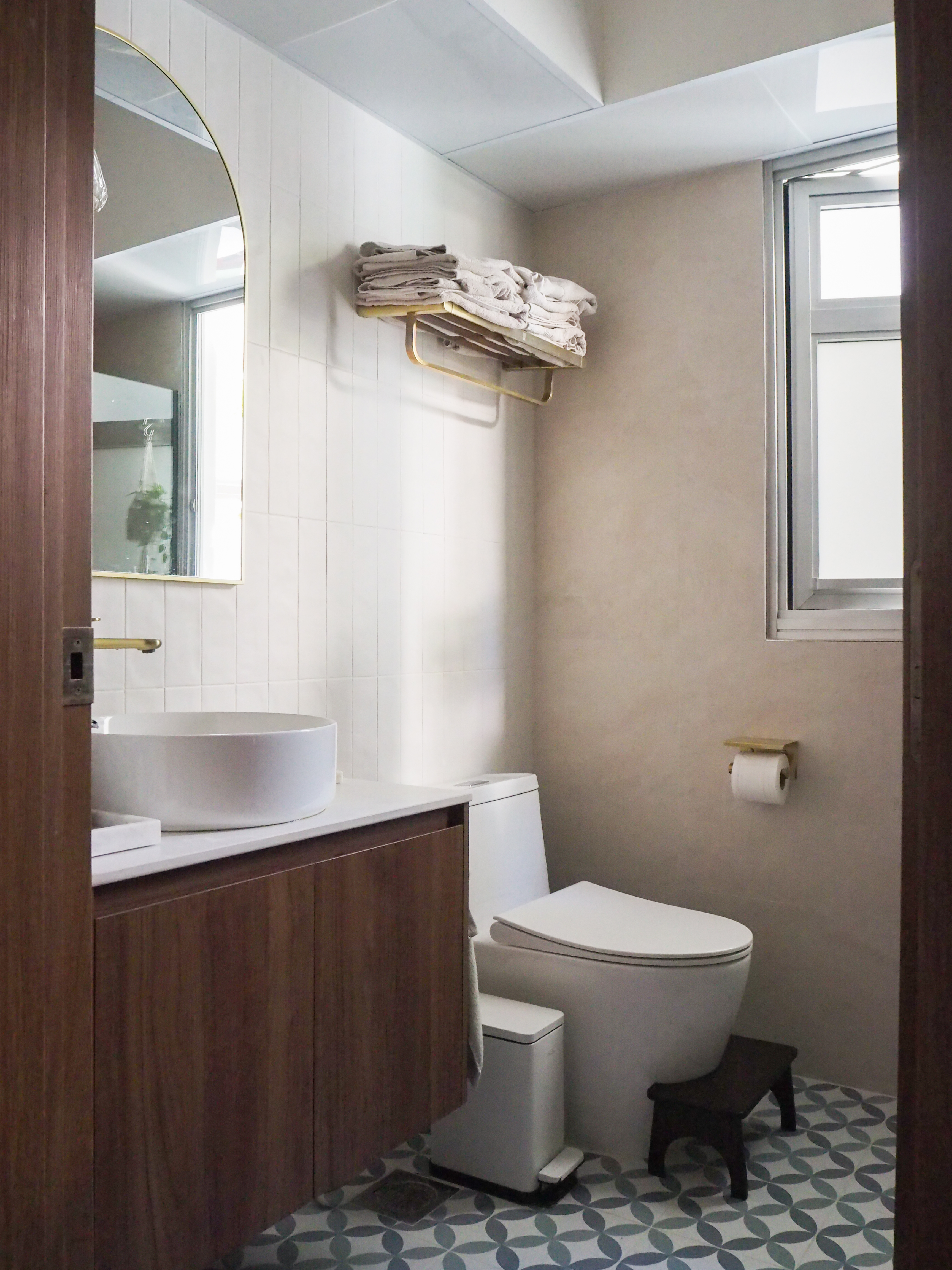Our vibrant and subtle Mid-Century Modern Boho bathrooms - Modern bathroom with white tiled walls, wooden vanity, white