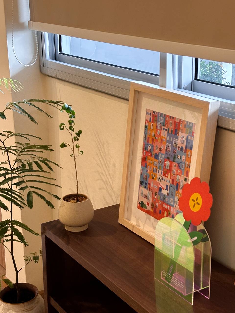 Top 3 Things for an Entryway - vibrant plant, colorful artwork, abstract painting, indoor setting, cozy corner, natural