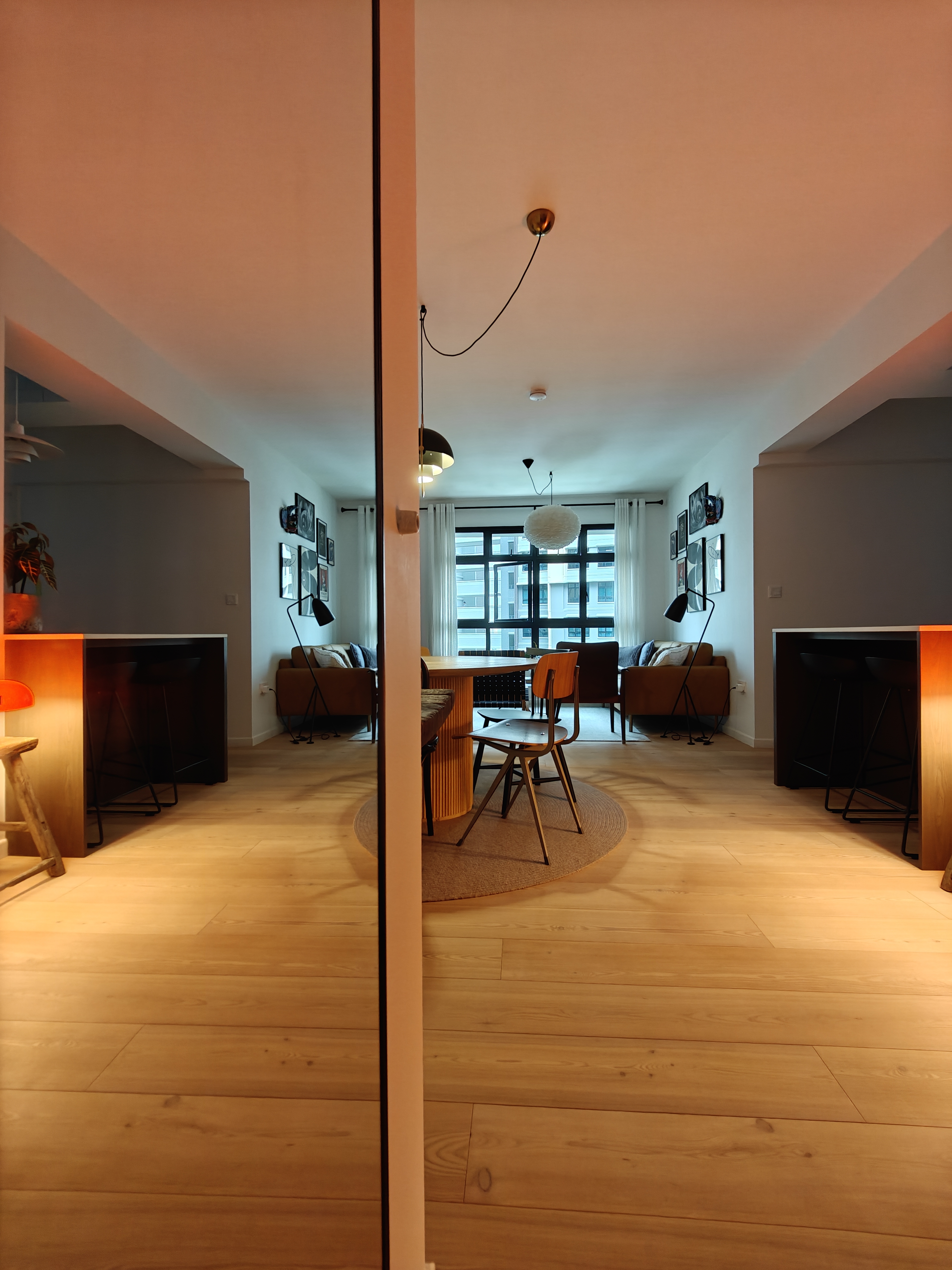 The Entry To Our World - Modern living room, cozy interior, minimalist design, wooden flooring, large windows, comfortable