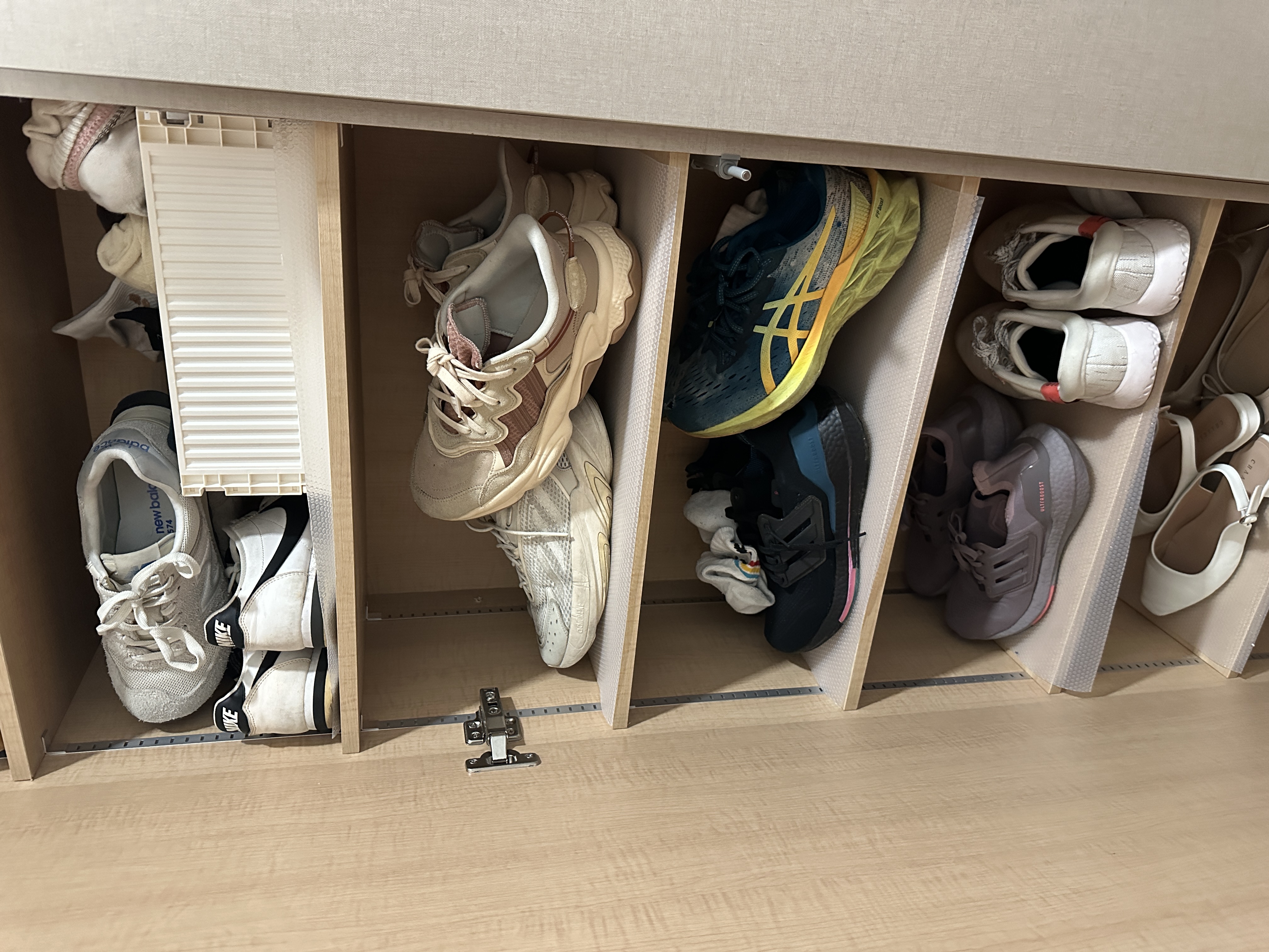 Entryway: Functional and well thought walkway into our home  - shoes neatly organized, shoe storage, shoe drawer, shoe rack