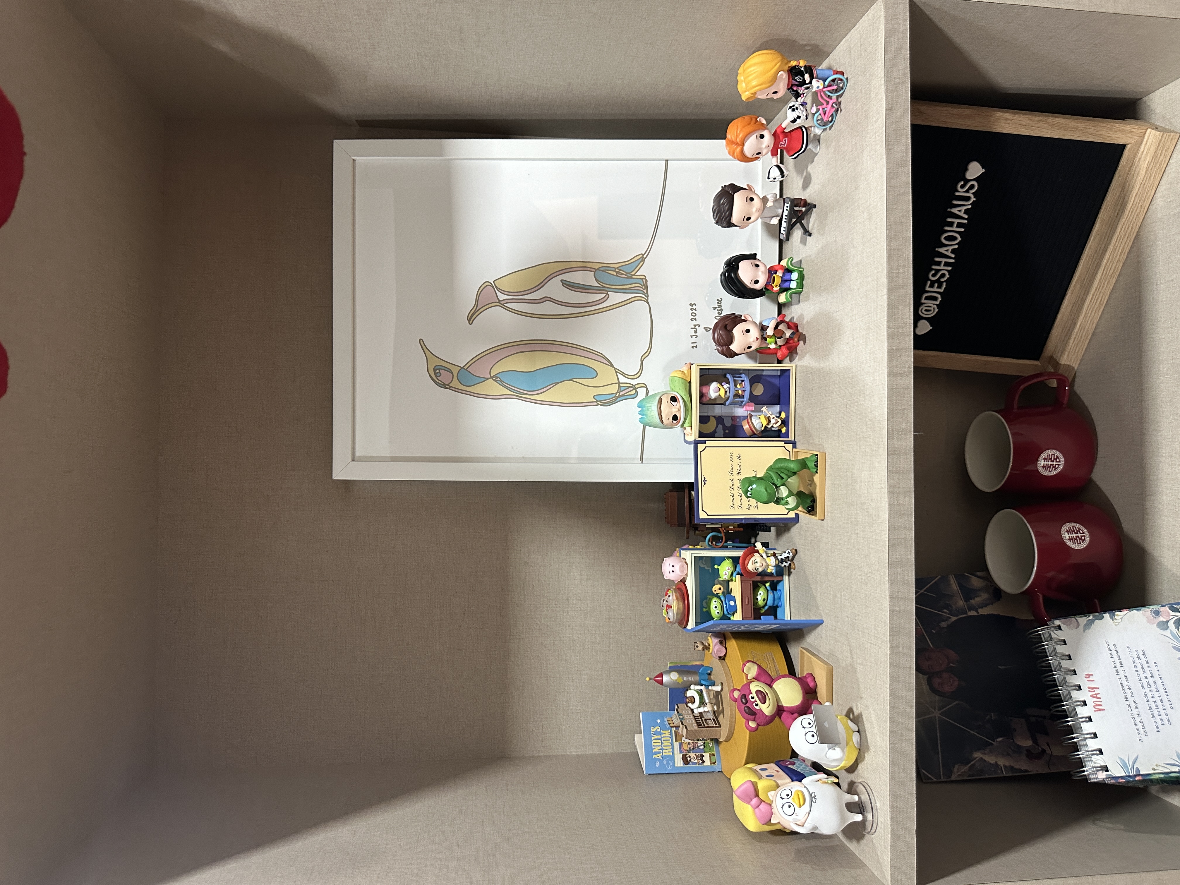 Entryway: Functional and well thought walkway into our home  - Toy display featuring colorful figurines and miniature models