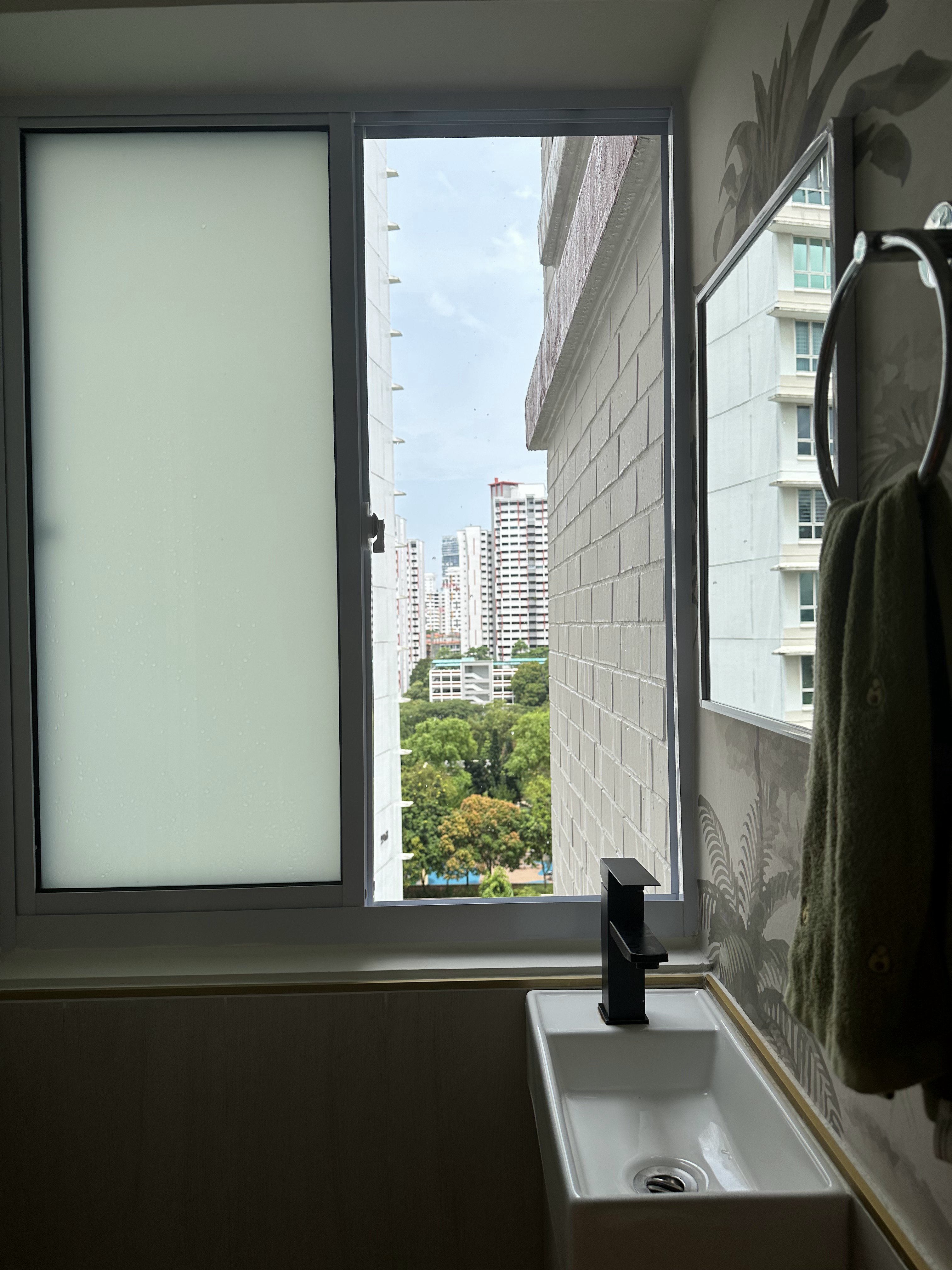 A Botanical Paradise at our Common Toilet - Modern bathroom, large window, frosted glass, white interior, green towel, black