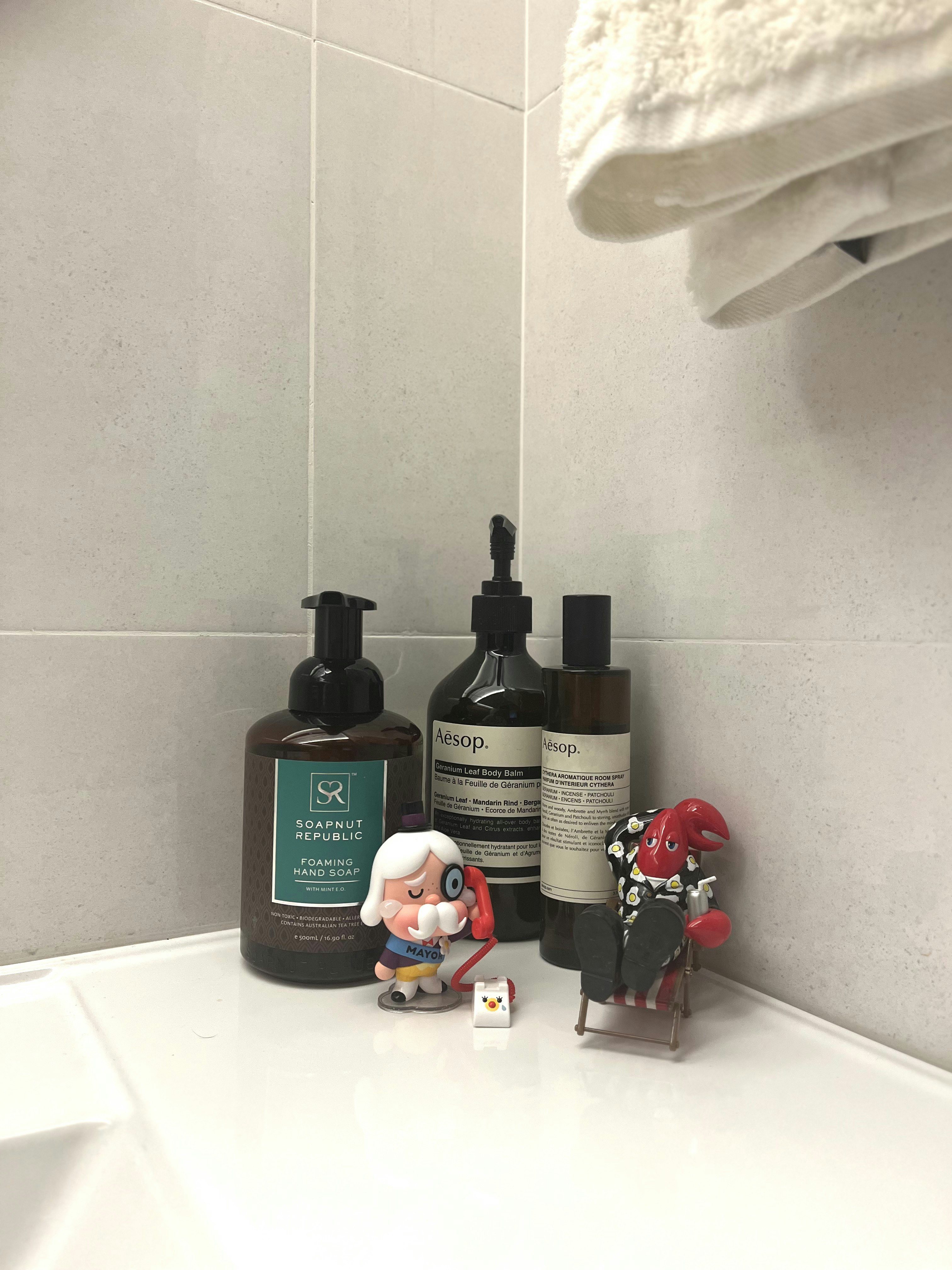 Into the room of the porcelain throne🚽🧻 - Soap bottles, bathroom counter, white tiles, vintage soap, hand soap, Aesop