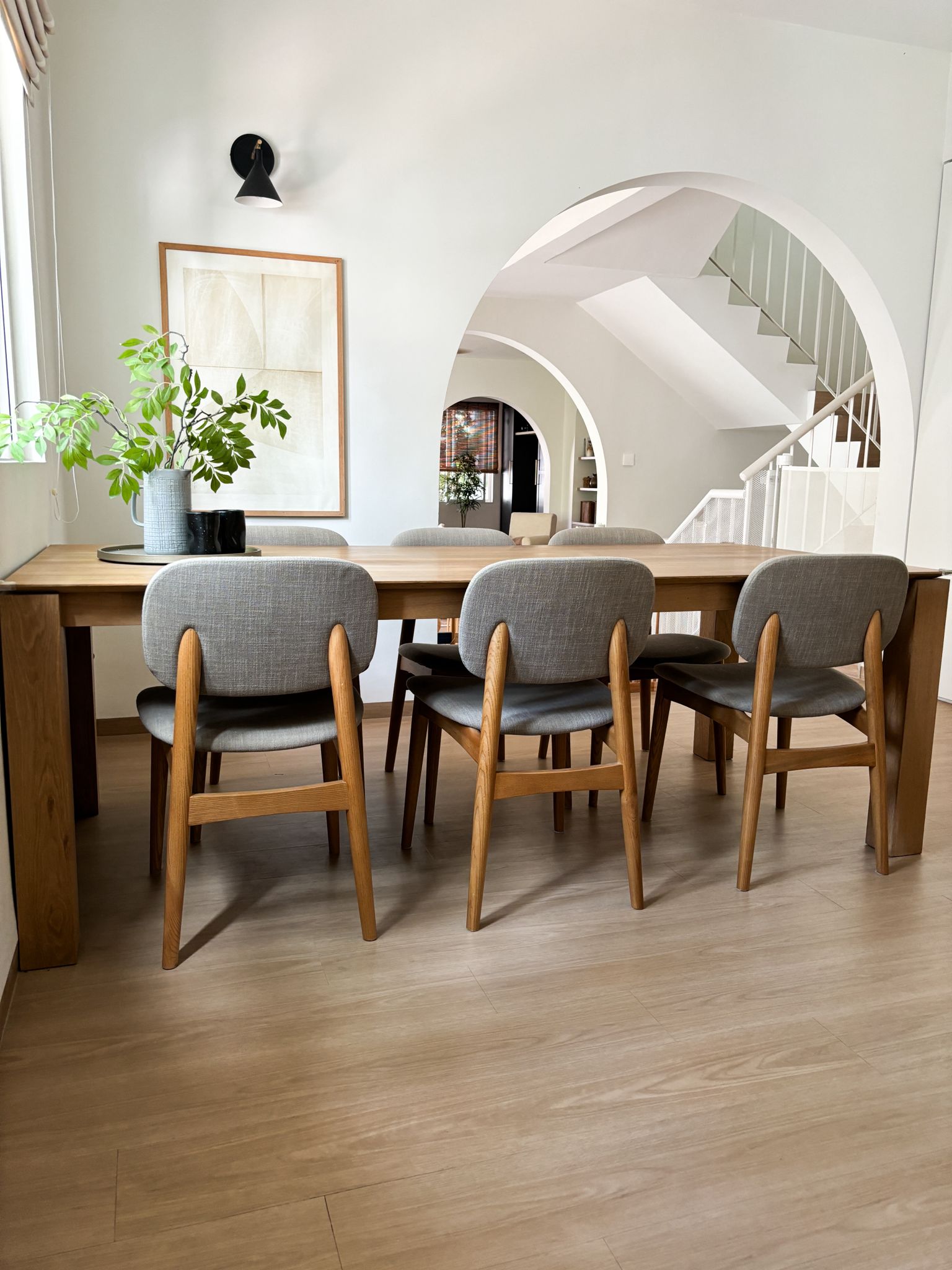 What we love about our warm and cosy home  - modern dining room, minimalist design, wooden dining table, gray upholstered