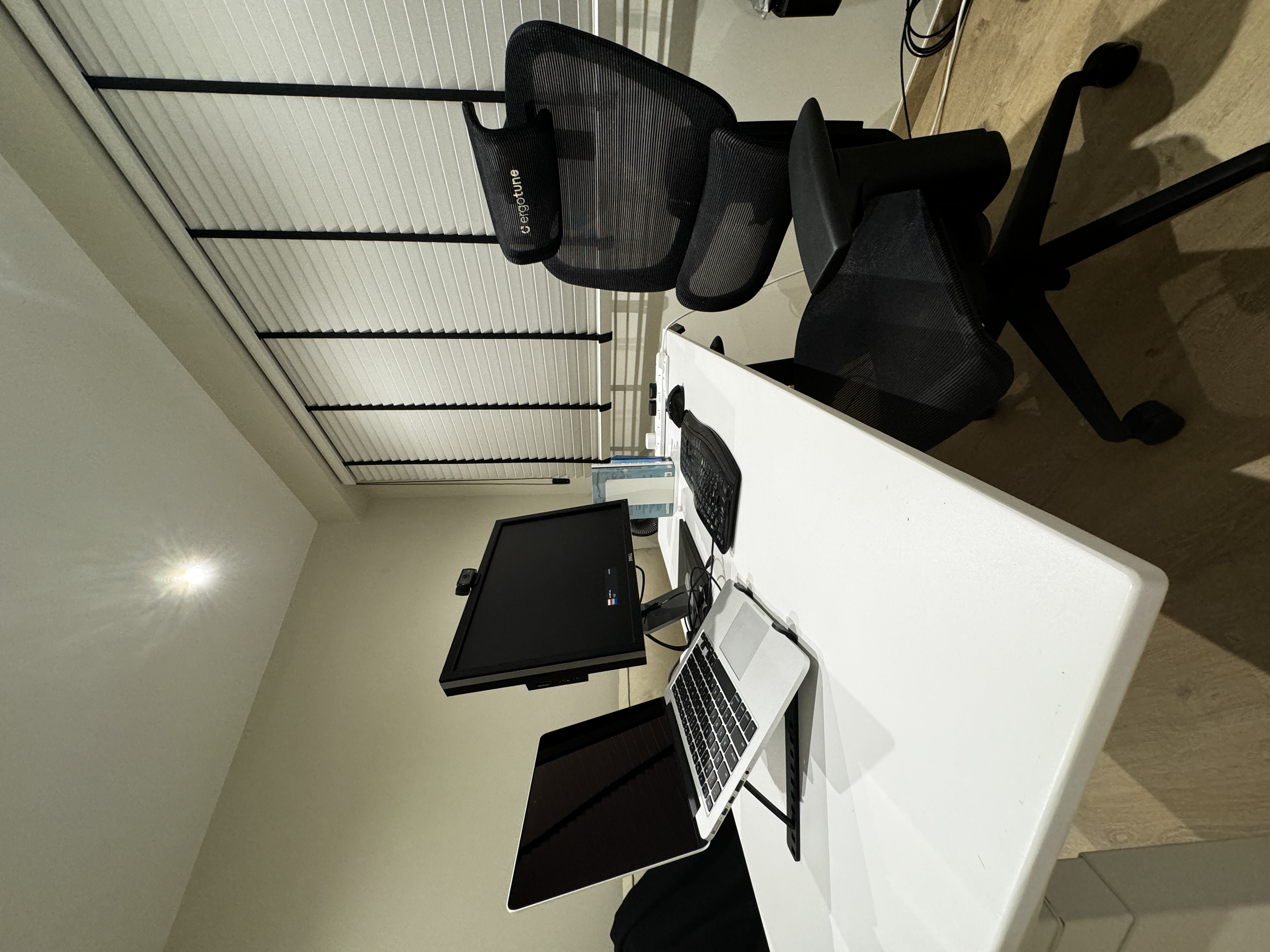 Transforming Our Guest Room into a Functional Workspace - Modern workspace, ergonomic chair, black mesh office chair, sleek