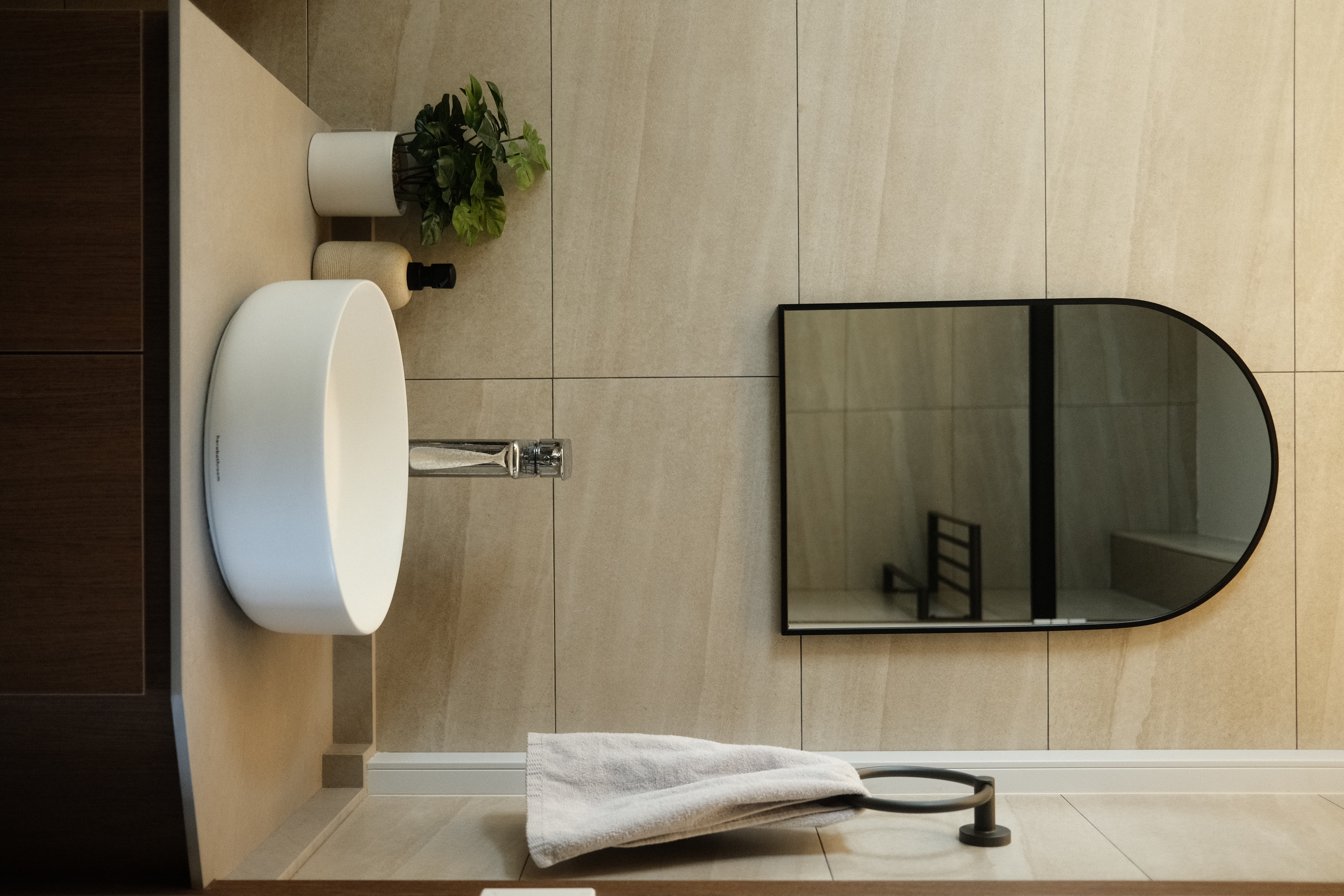 Balancing cost with aesthetics in our bathrooms  - Modern bathroom, minimalist design, sleek fixtures, white porcelain sink