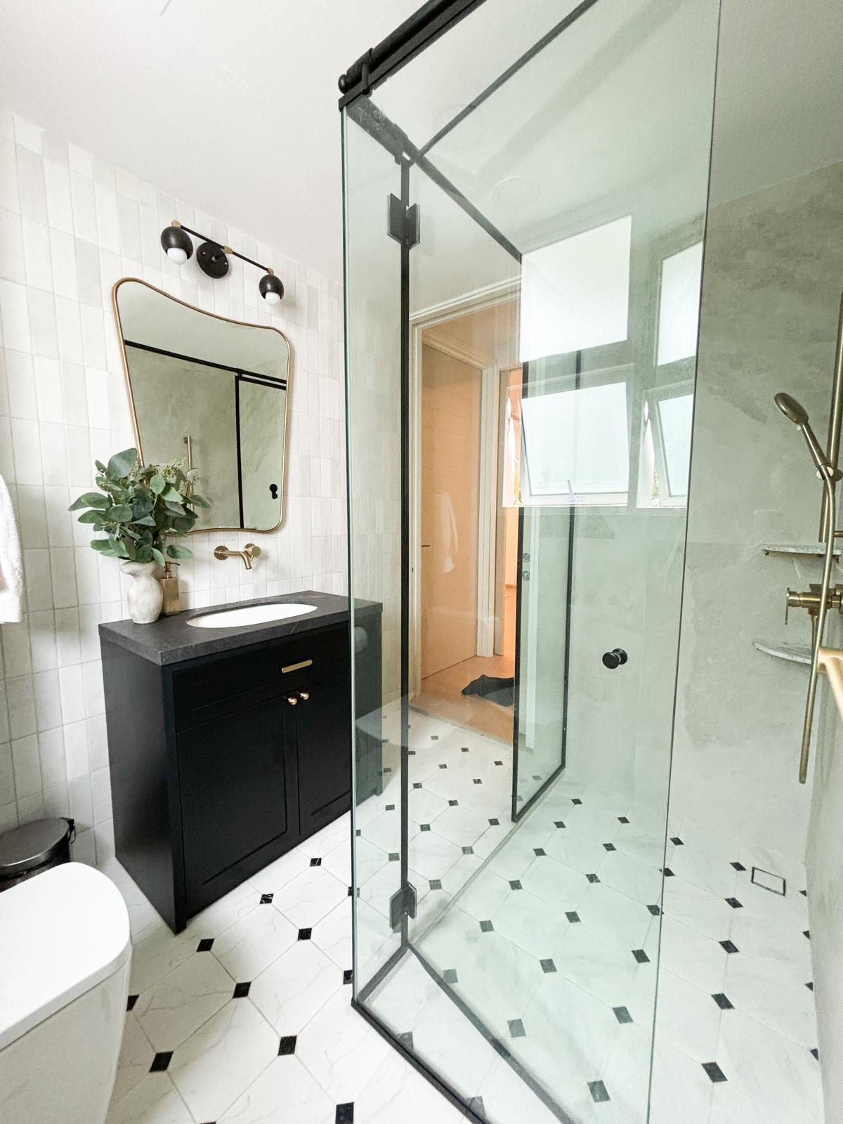 Black-and-white-bathroom-with-lots-of-natural-lighting-
