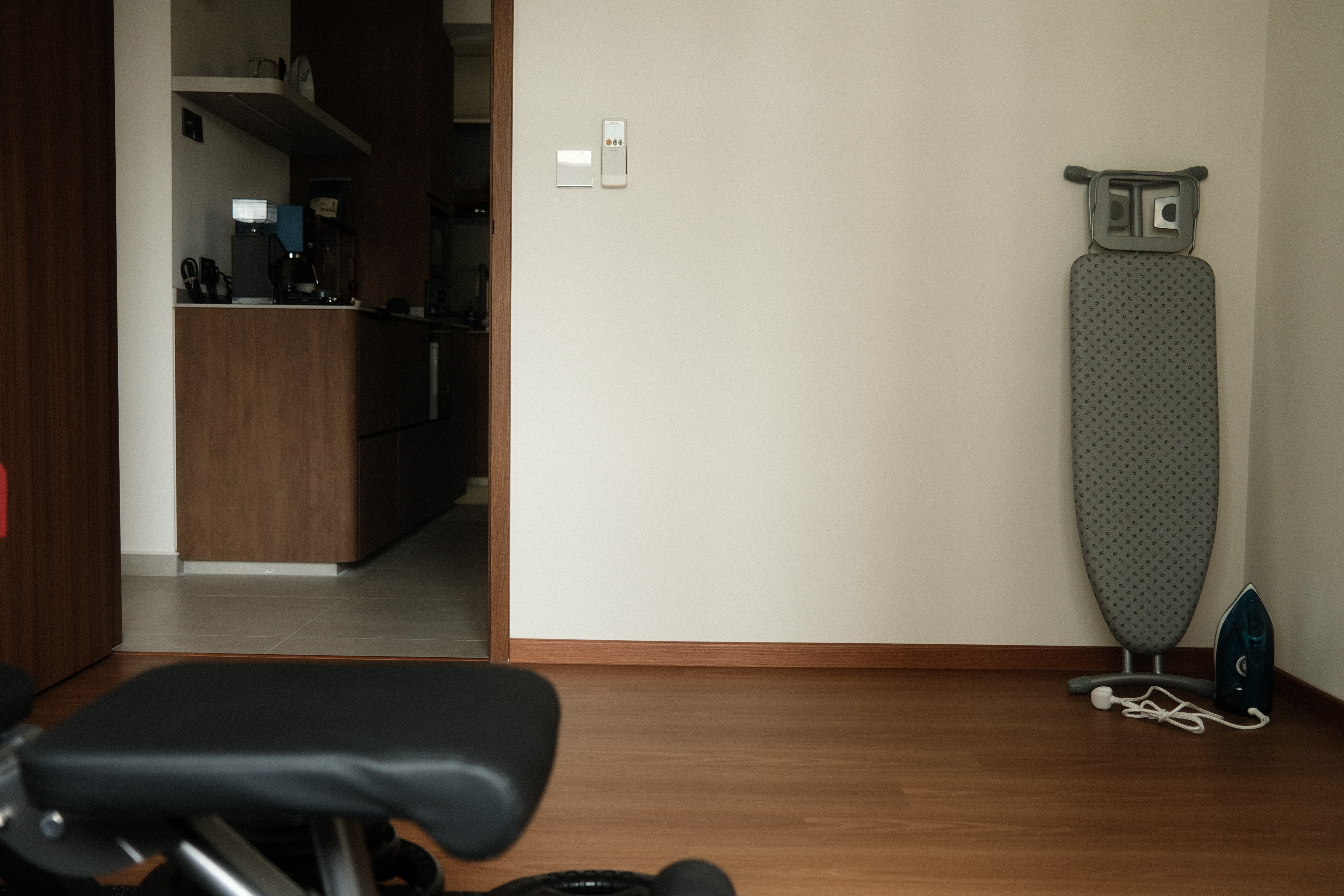 Trying to be healthy in our home gym - kitchen, dining area, kitchen island, wooden cabinets, countertop, coffee machine