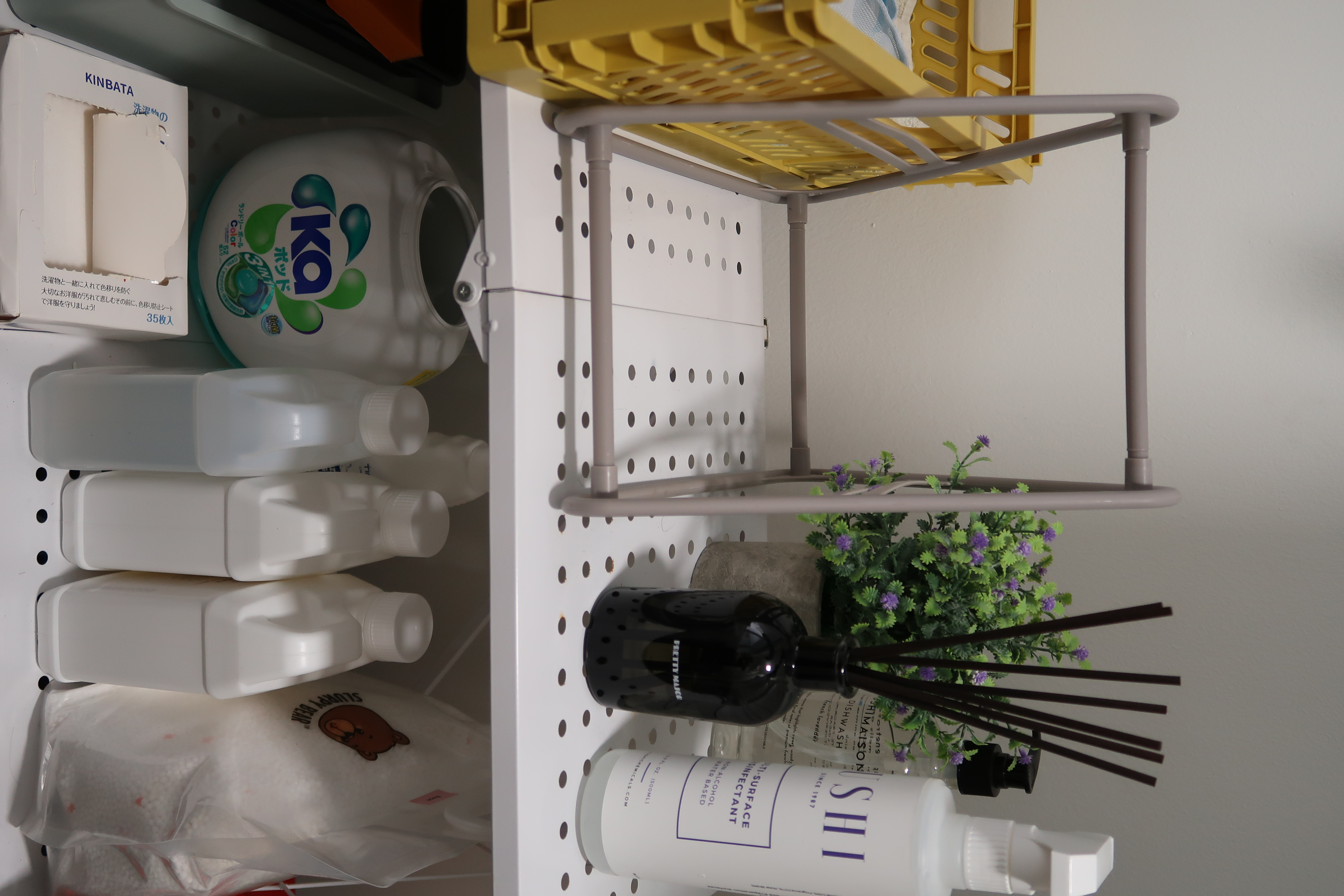 Service Yard: Bigger than expected  - Detergent bottle, white bottle, shampoo, conditioner, soap, laundry detergent, white