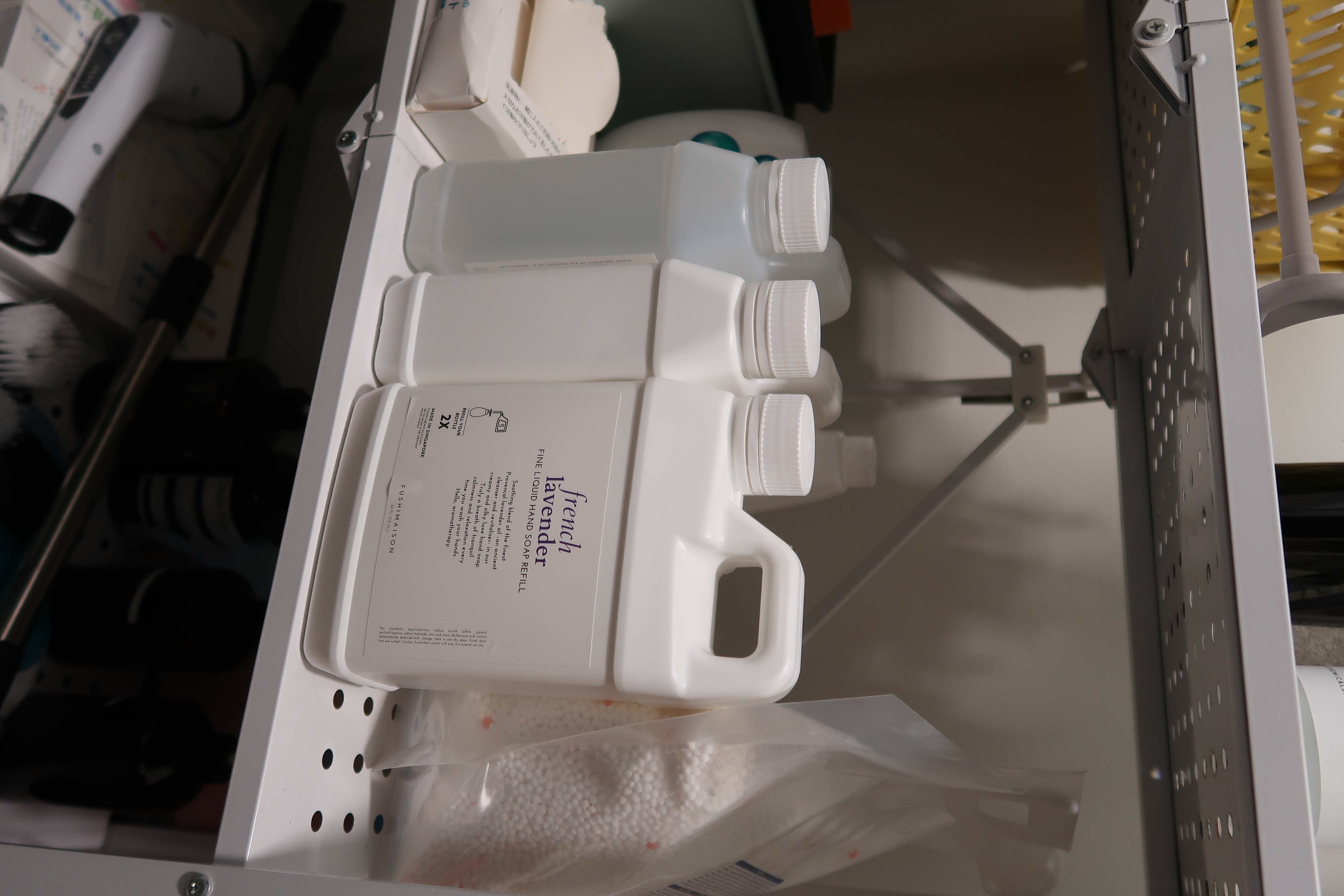 Service Yard: Bigger than expected  - Step-5 cleaning solution, lavender liquid, French lavender, white plastic bottles