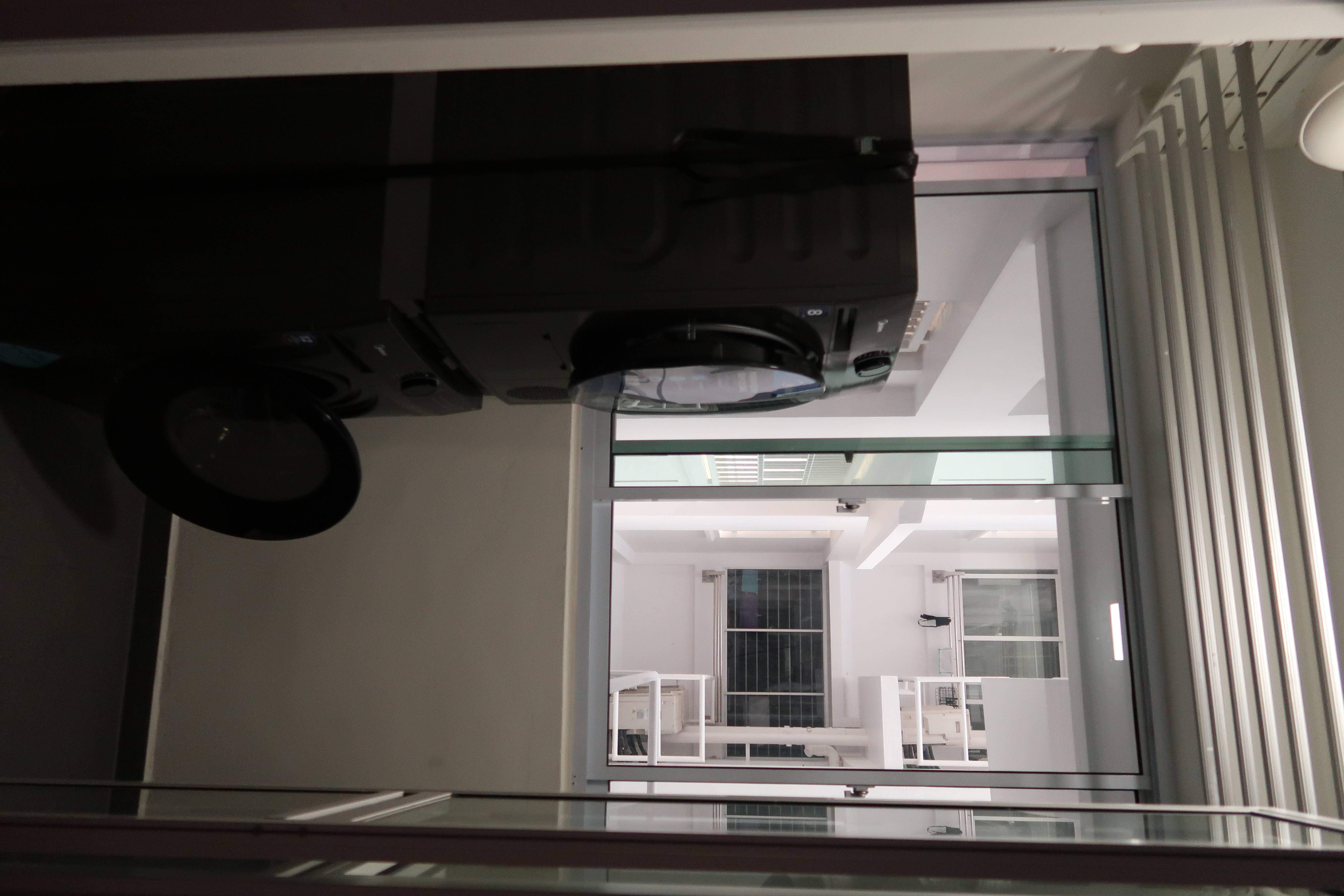 Service Yard: Bigger than expected  - Modern minimalist interior, large window, bright lighting, sleek design, contemporary