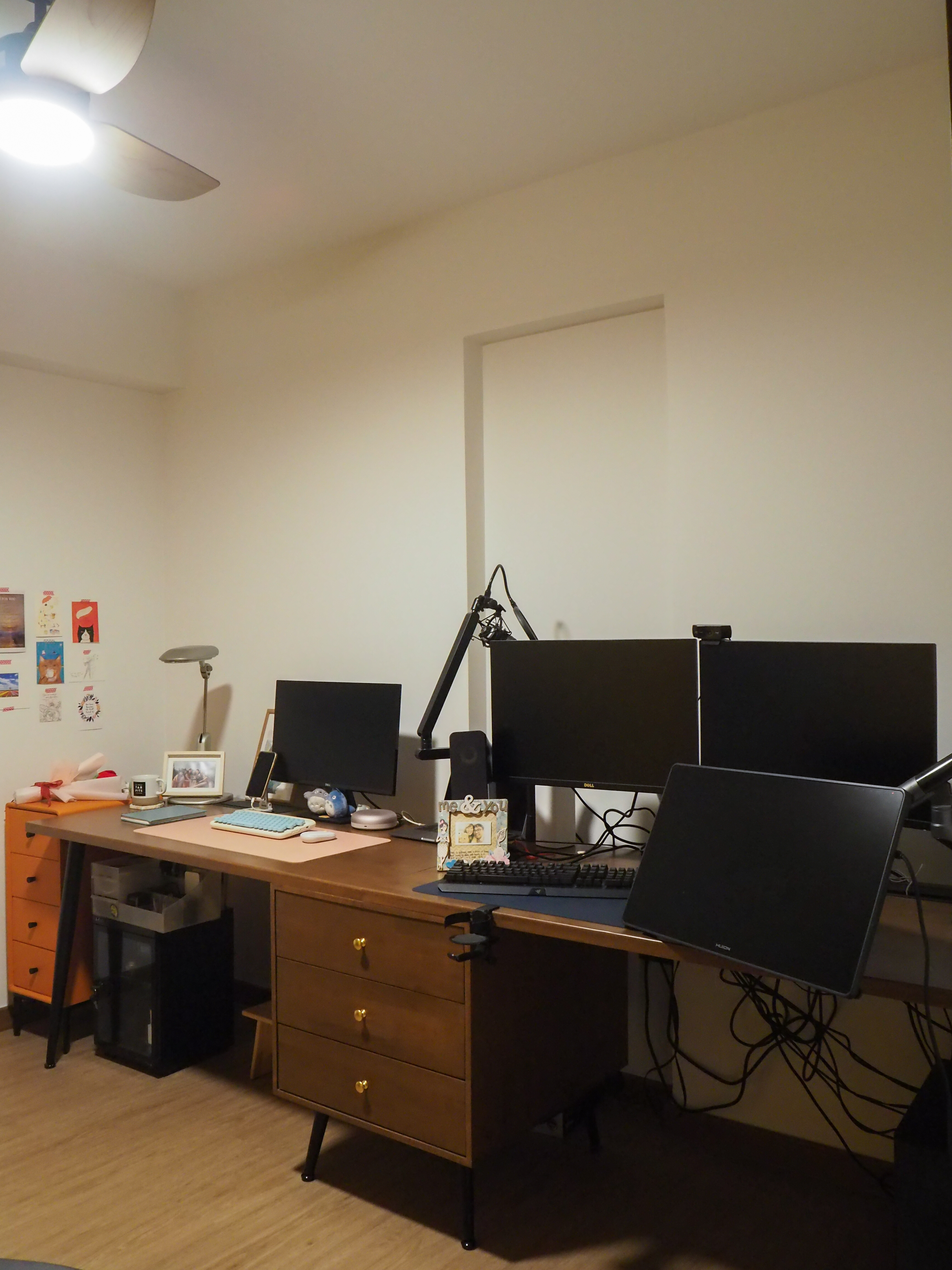 Our Workspace with zero built-in + pops of colours - Wooden desk, black monitors, black keyboard, black mouse, black speaker