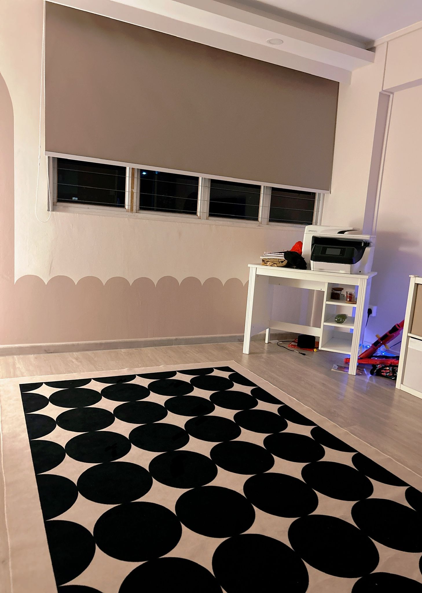 From Bedroom to Entertainment room - Modern minimalist room, beige walls, large window with blinds, black and white patterned