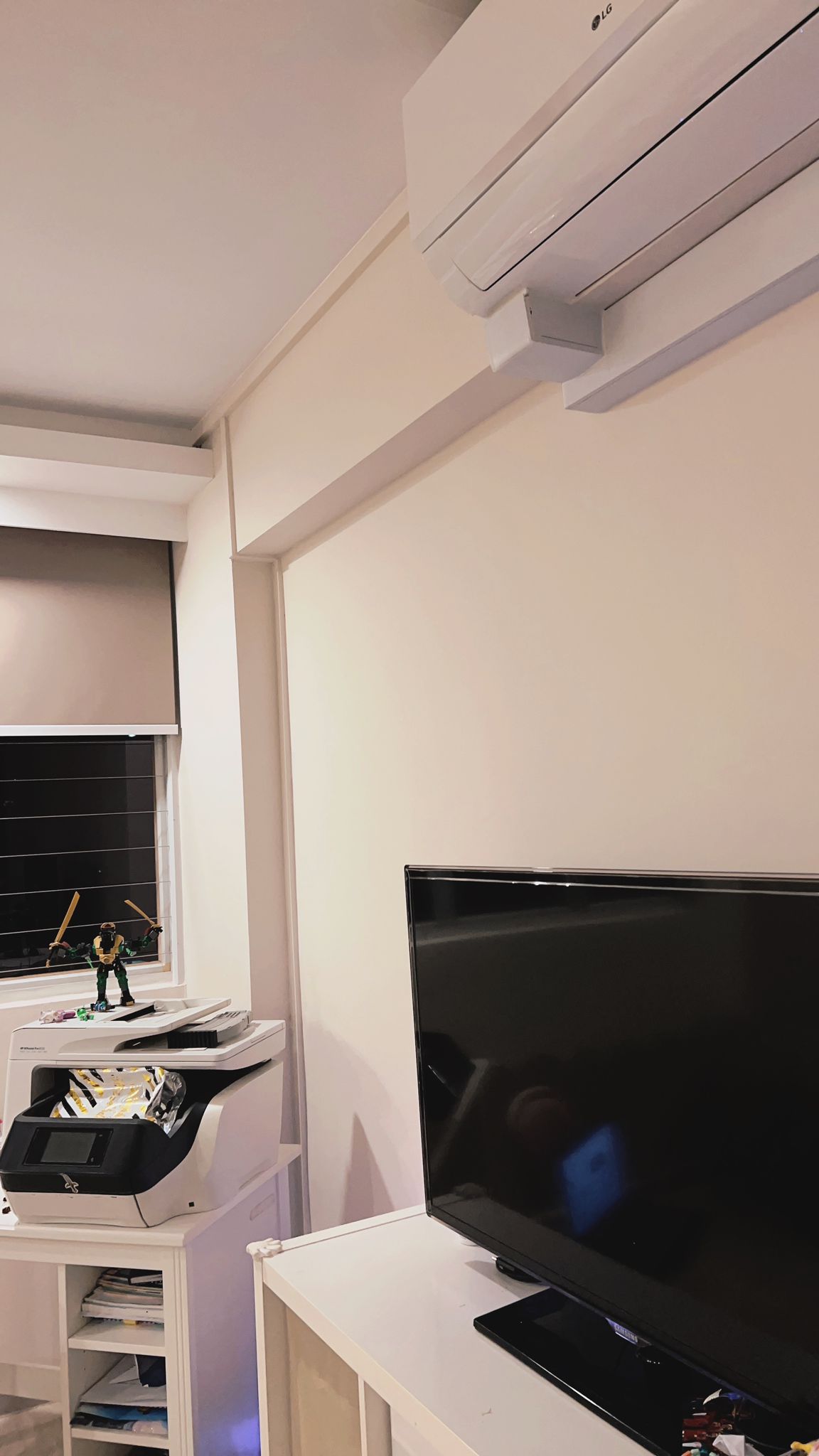 From Bedroom to Entertainment room - Air conditioner, window, TV, black screen, white air conditioner unit, toy figure