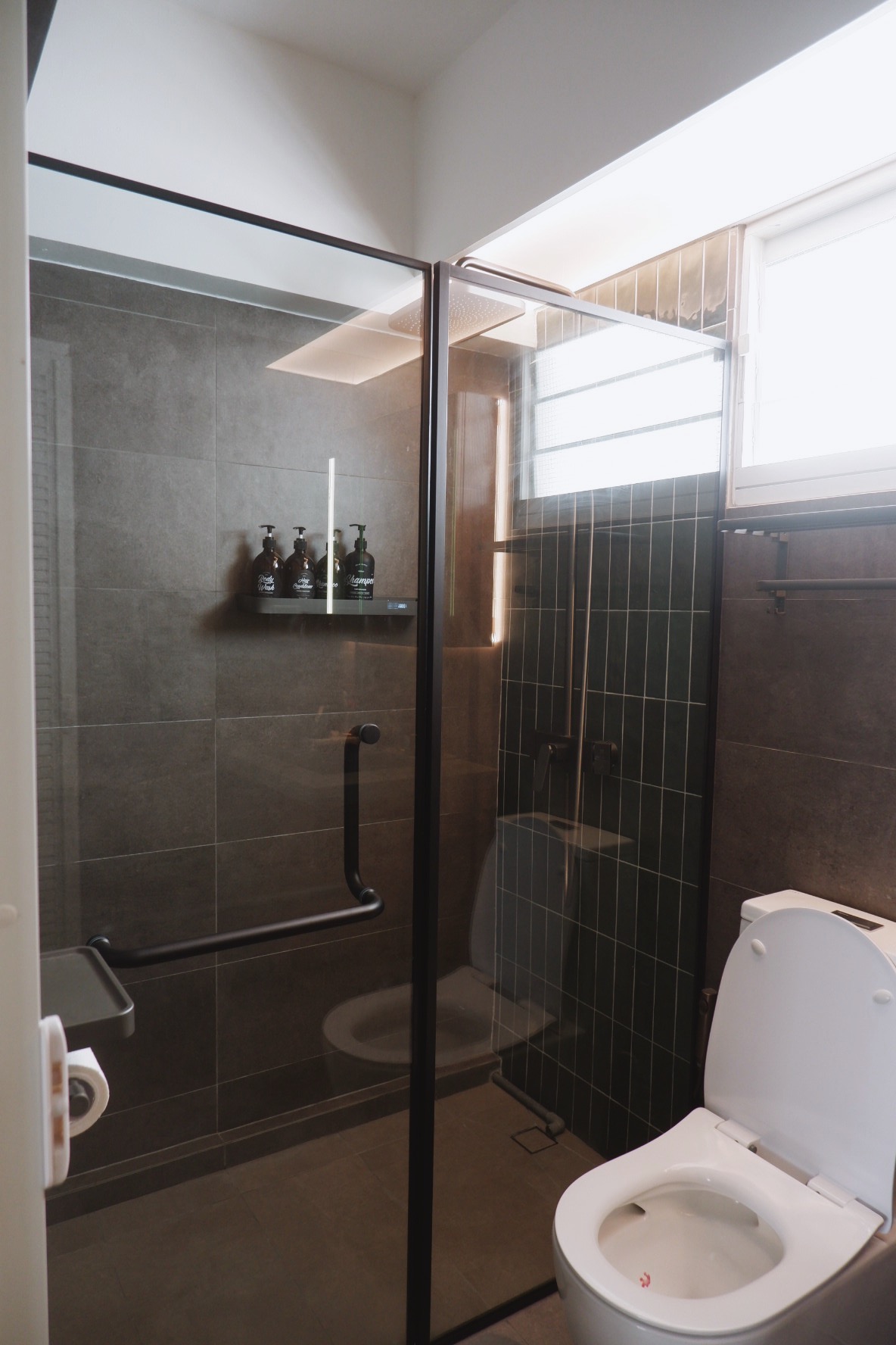Our Bathrooms: My husband and I designed a bathroom each - shower enclosure, glass shower door, black frame, tiled walls