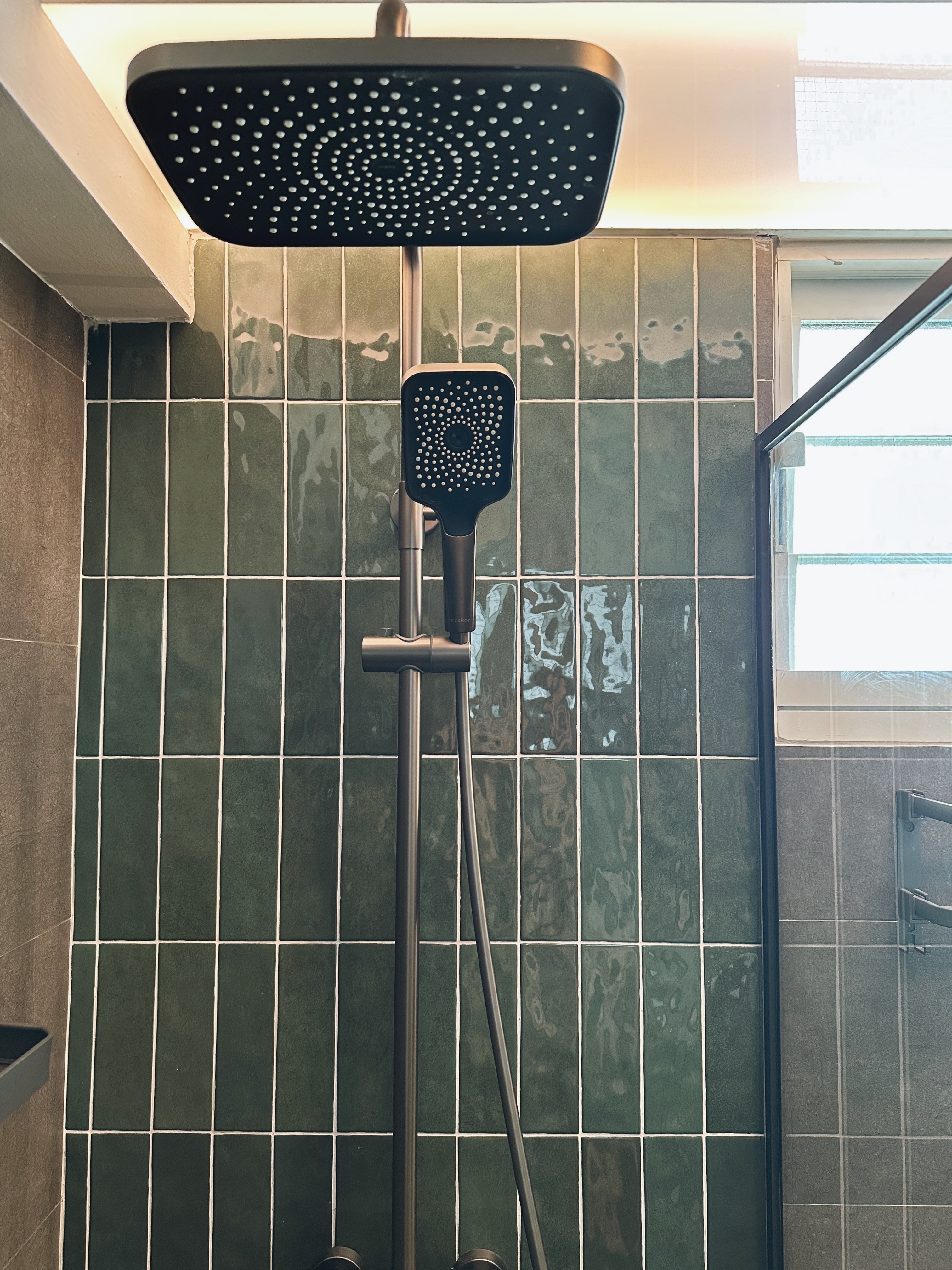 Our Bathrooms: My husband and I designed a bathroom each - showerhead, modern shower, tiled wall, green tiles, shower