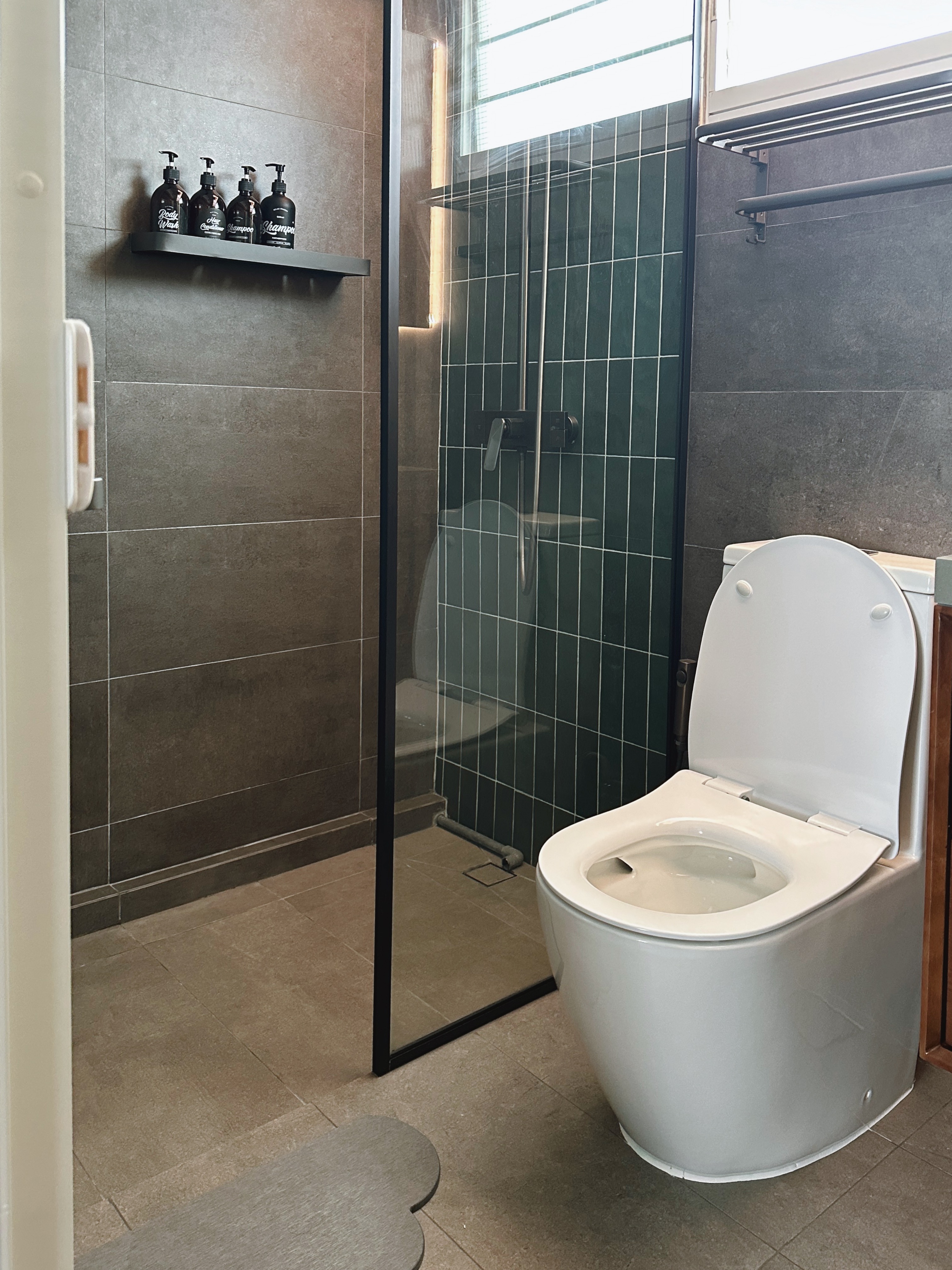 Our Bathrooms: My husband and I designed a bathroom each - Grey tiled walls, modern shower, glass shower door, sleek toilet