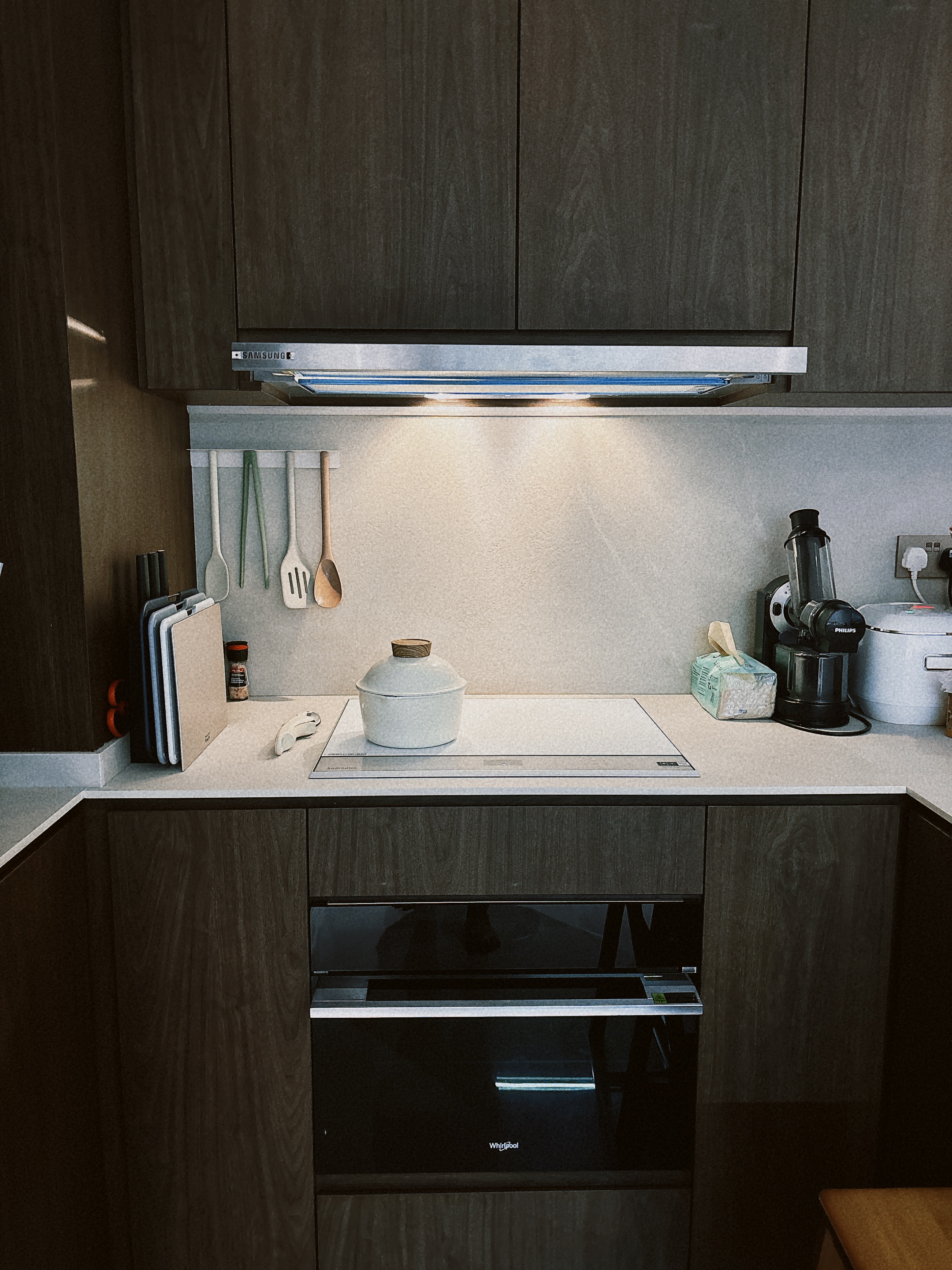 Our six-tile kitchen  - modern kitchen, compact space, stainless steel range, wooden cabinets, white countertop, built-in