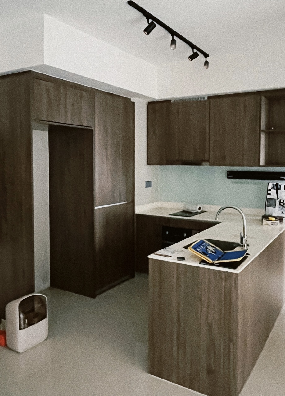 Small add-ons, big difference! - Wooden cabinetry, modern kitchen, beige countertops, built-in appliances, open doorway