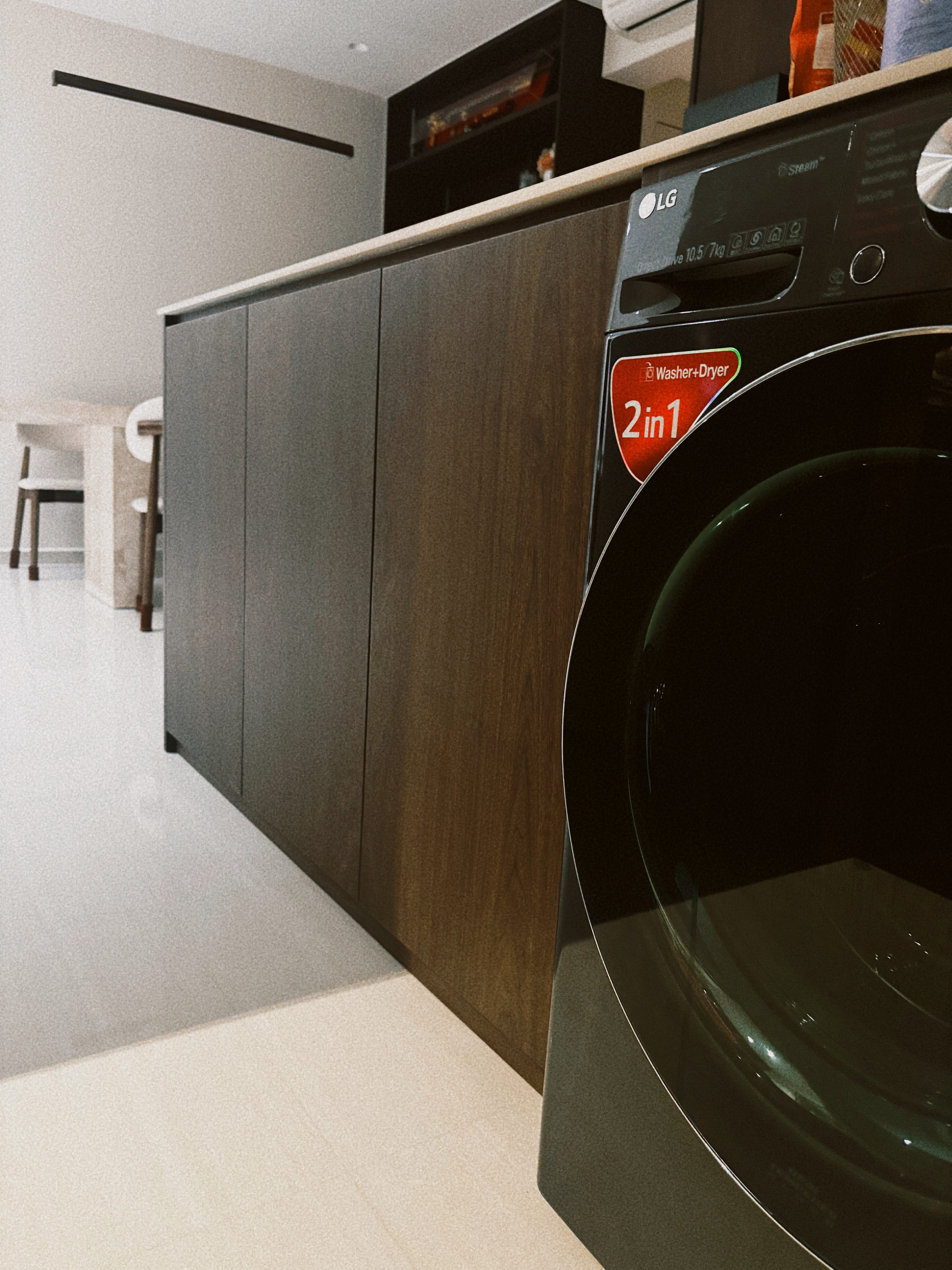 Small add-ons, big difference! - Modern kitchen, LG washing machine, 2 in 1 feature, sleek design, dark wood cabinets