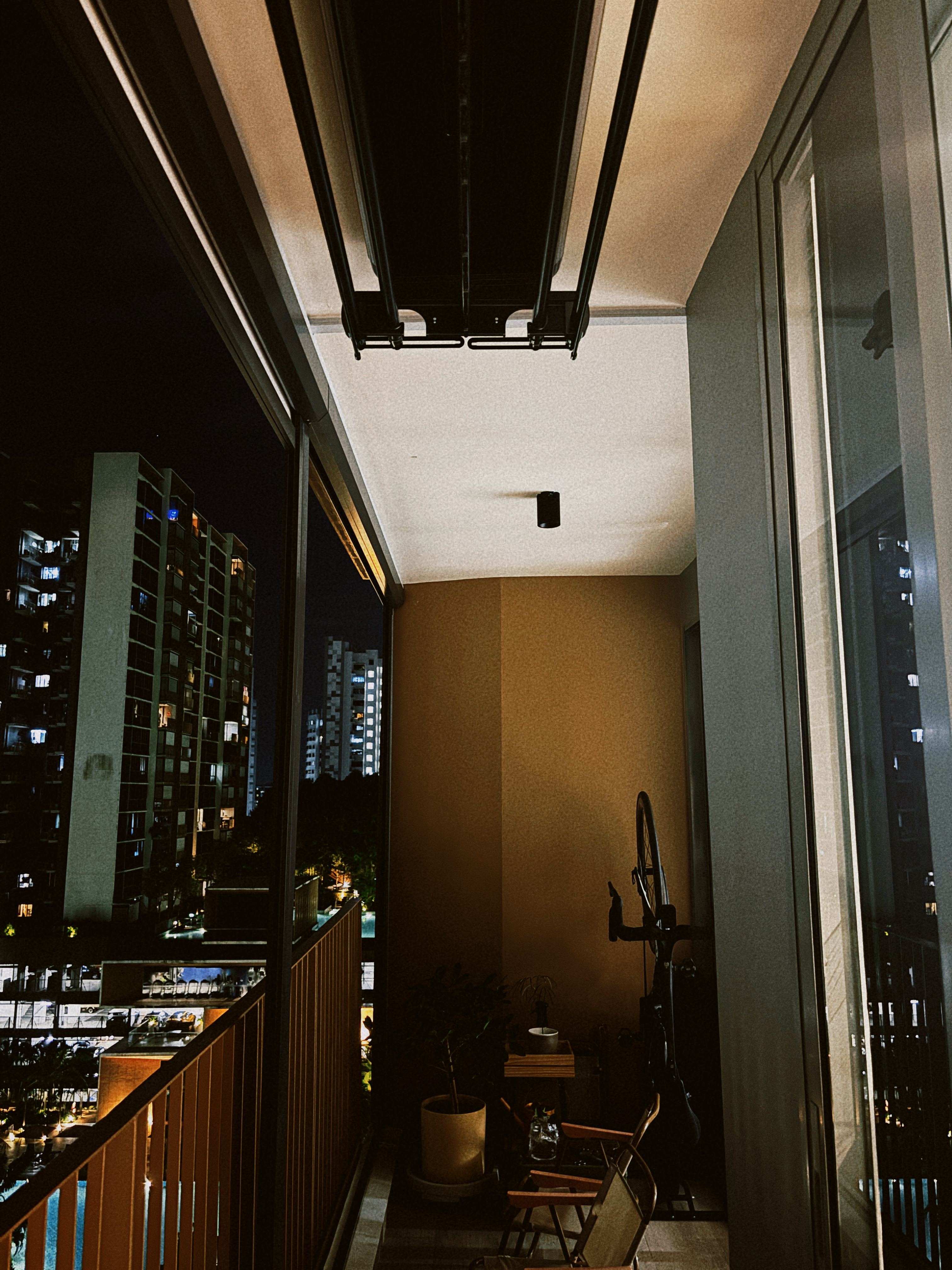 Strategic planning ideas for laundry and small homes. - Nighttime cityscape, tall buildings, illuminated windows, dark sky