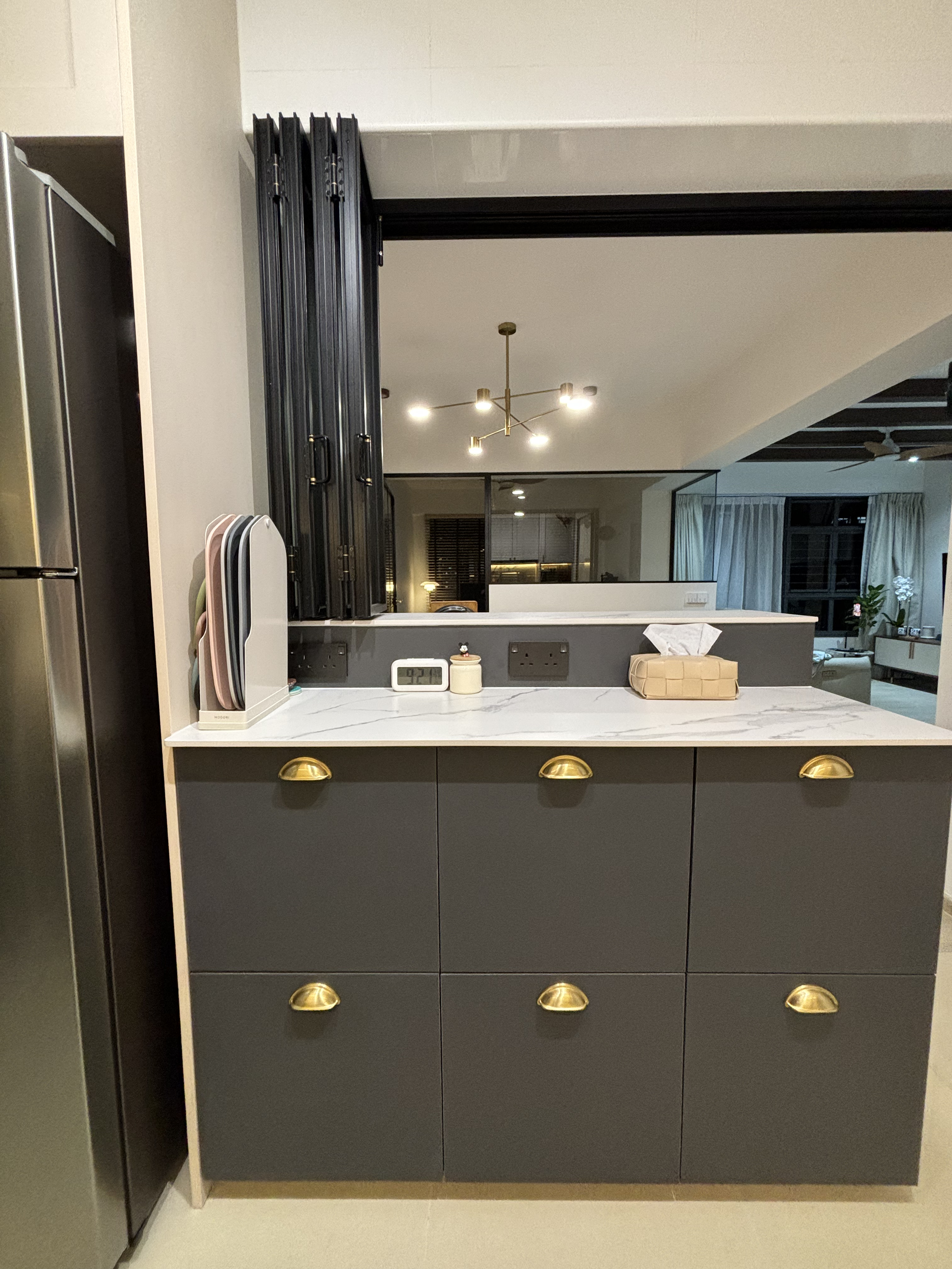 5 best purchases to make our life easier at home! - modern kitchen cabinetry, sleek design, dark gray cabinets, gold handles